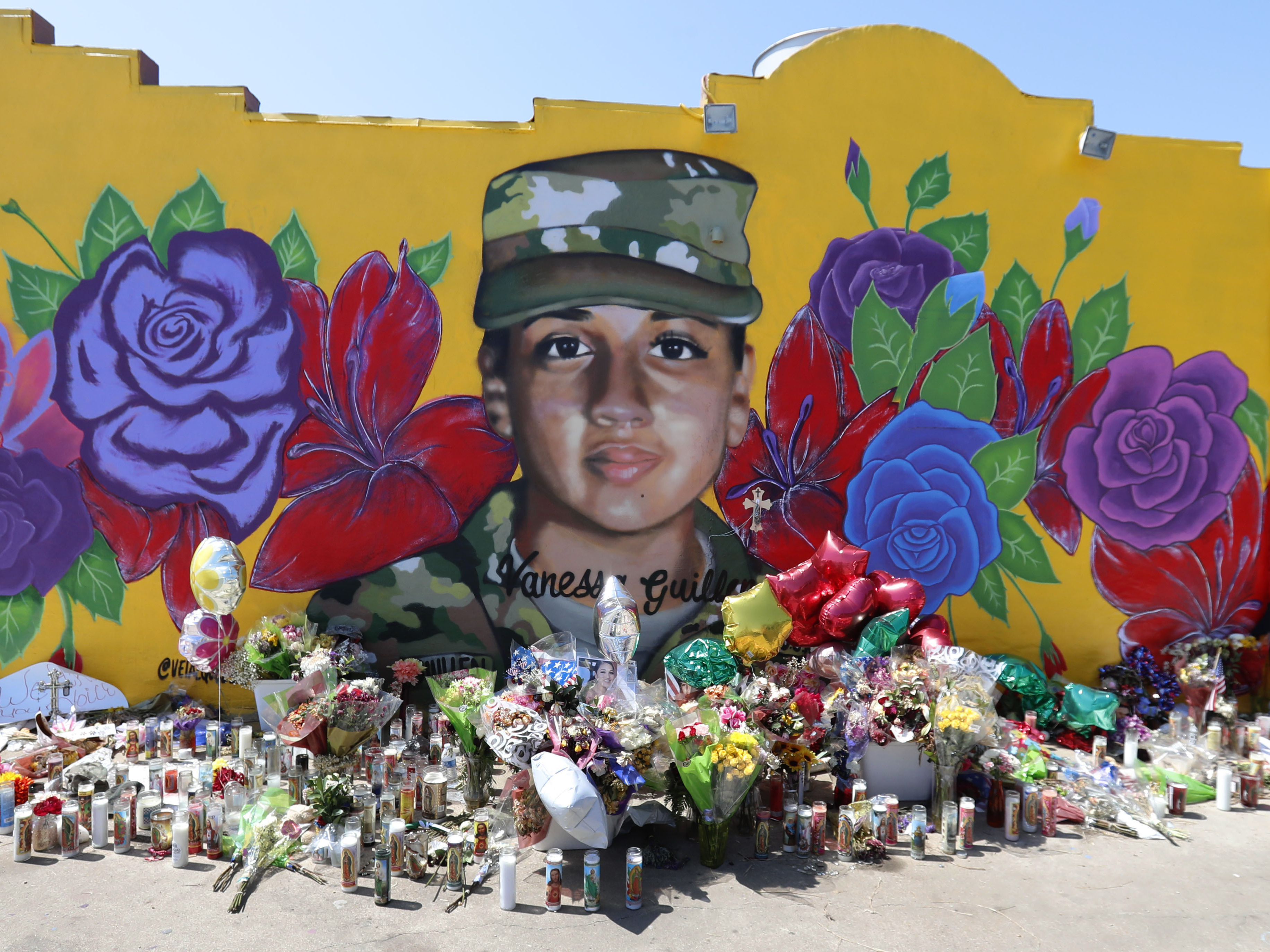 A mural of slain Army Spc. Vanessa Guillén in the south side of Fort Worth, Texas. The Army says it will expand its inquiry into the killing of Guillén, who is one of a string of disappearances and deaths at the Texas post. (LM Otero/AP)