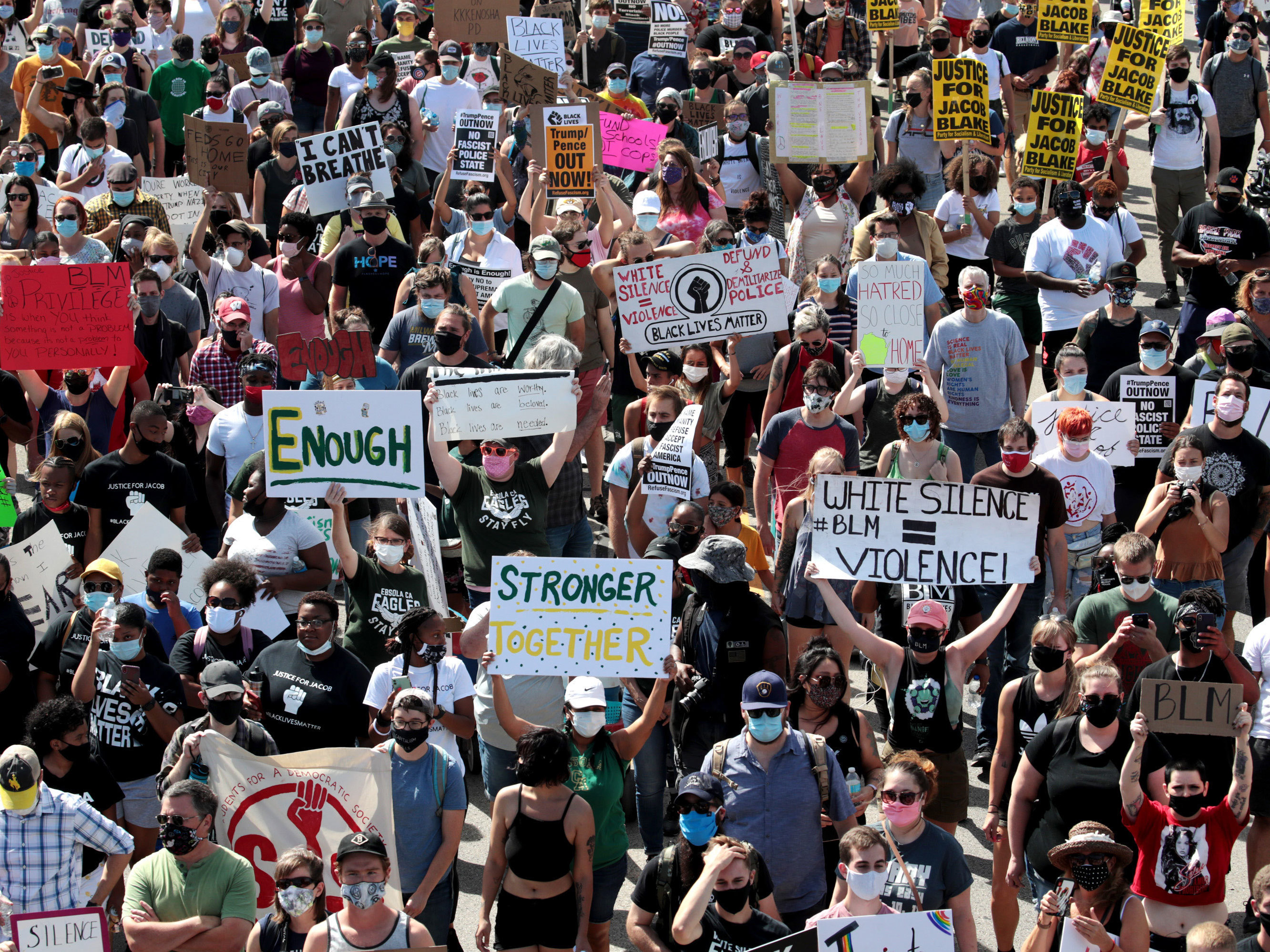 People march in support of Jacob Blake and his family to the Kenosha County Courthouse in Kenosha, Wis., in August. (Getty Images)