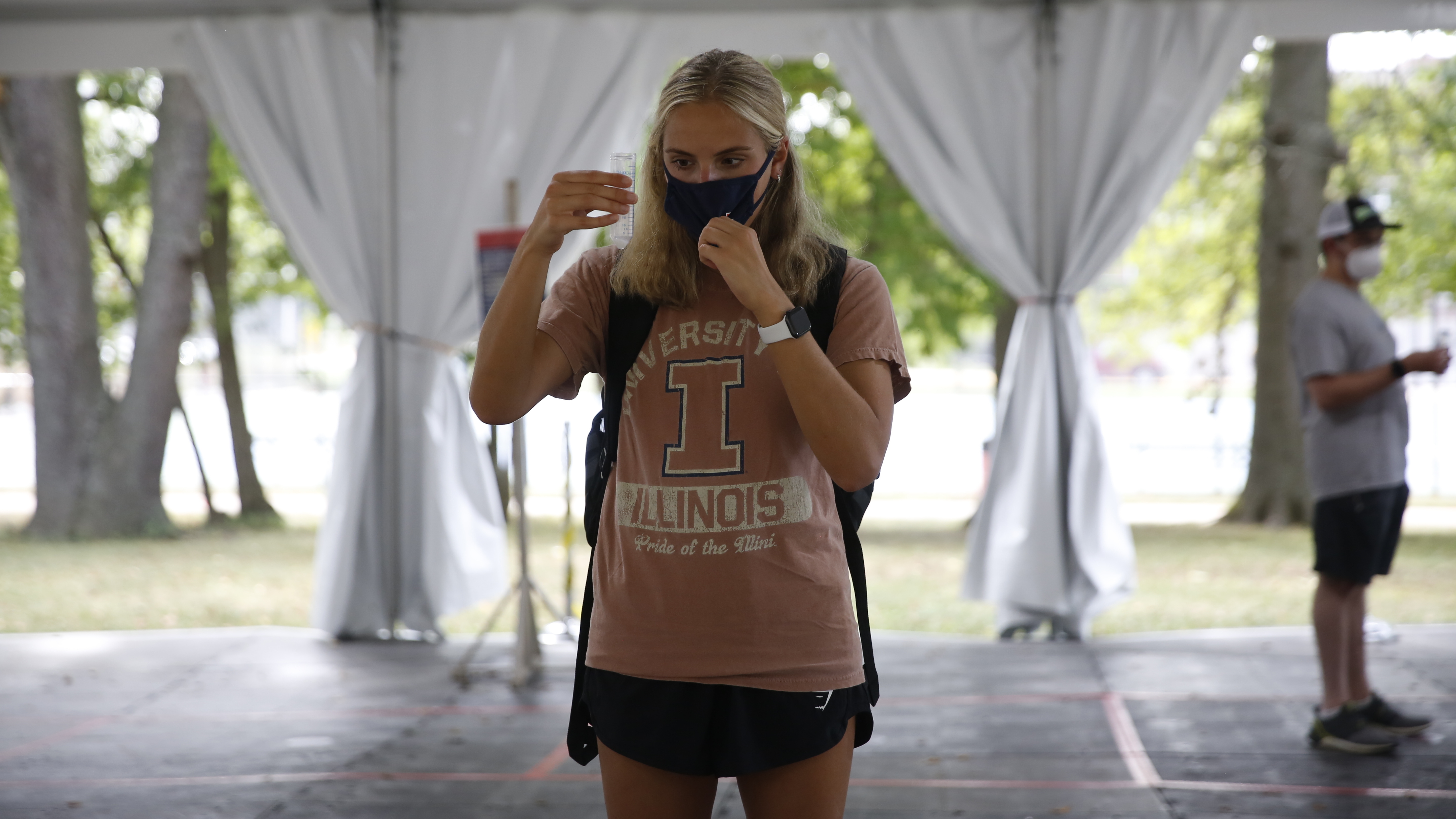 Emily Garti, a junior studying nutrition, gets her twice-weekly COVID-19 test at the University of Illinois at Urbana-Champaign. (NPR)