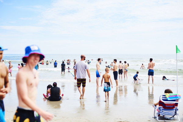 People roamed the beach in Ocean City, N.J, at the start of August. As Labor Day weekend arrives, Dr. Anthony Fauci, director of the National Institute of Allergy and Infectious Diseases, said Americans should remain vigilant to avoid another surge in coronavirus infection rates.