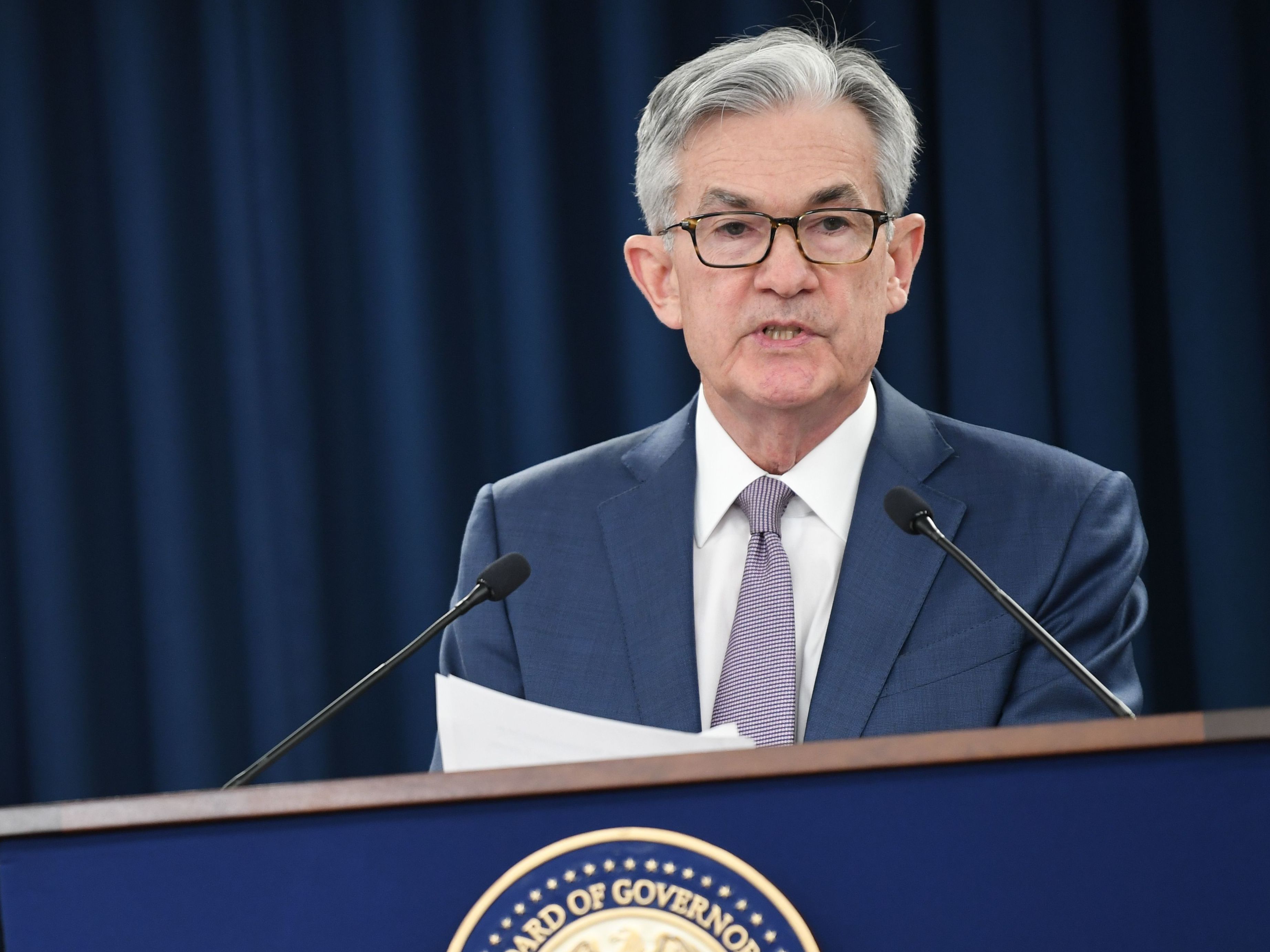Federal Reserve Chairman Jerome Powell speaks to reporters in March in Washington, D.C. In an interview Friday with NPR, Powell said it may take years before the economy has fully recovered. (AFP via Getty Images)