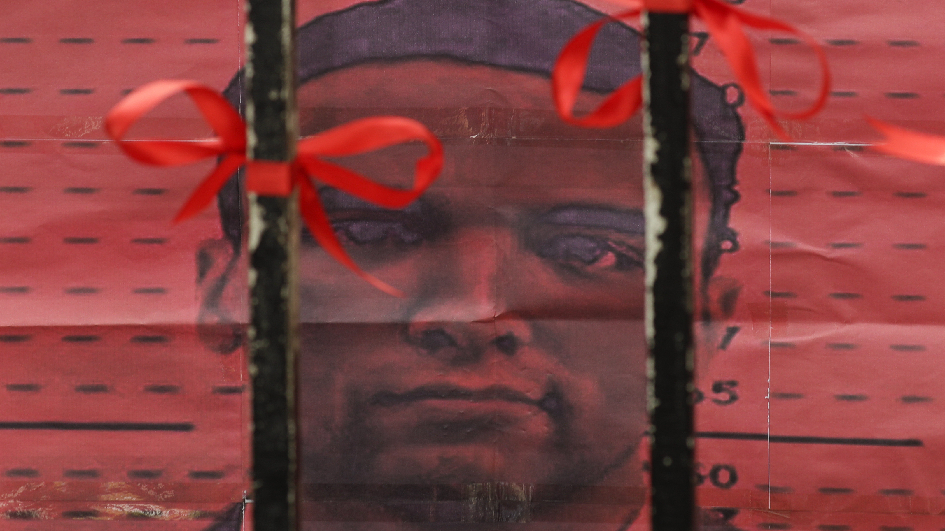 U.S. Marine Lance Cpl. Joseph Scott Pemberton is seen from behind the gates of the Department of Justice in Manila, Philippines. Philippines President Rodrigo Duterte granted Pemberton a pardon following his conviction in the 2014 killing of a transgender Filipino woman.
