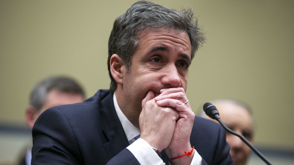 Michael Cohen, former personal lawyer to President Trump, listening to closing statements during a House Oversight Committee hearing in Feb. 2019.