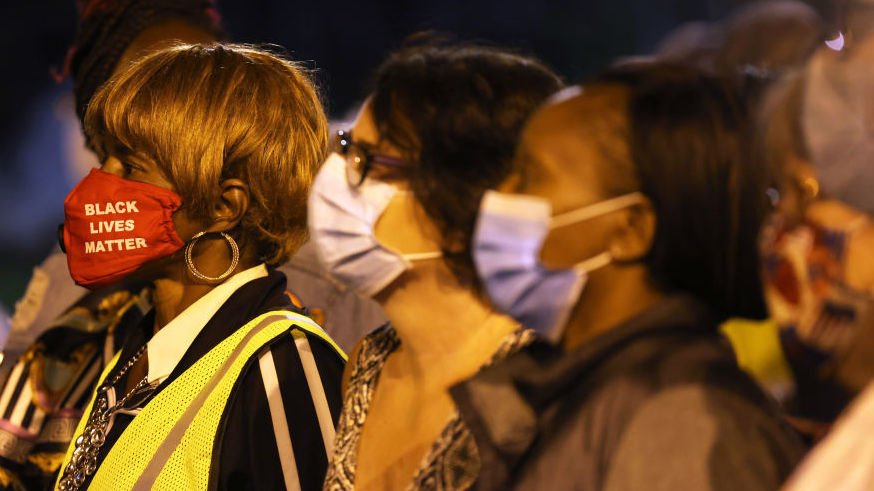 Elders stand on the front line in a march for Daniel Prude on Sunday in Rochester, N.Y. Prude died in March a week after police pinned him to the ground. It was the fifth consecutive night of protesting since the release of police body-camera footage of Prude's arrest. (Getty Images)