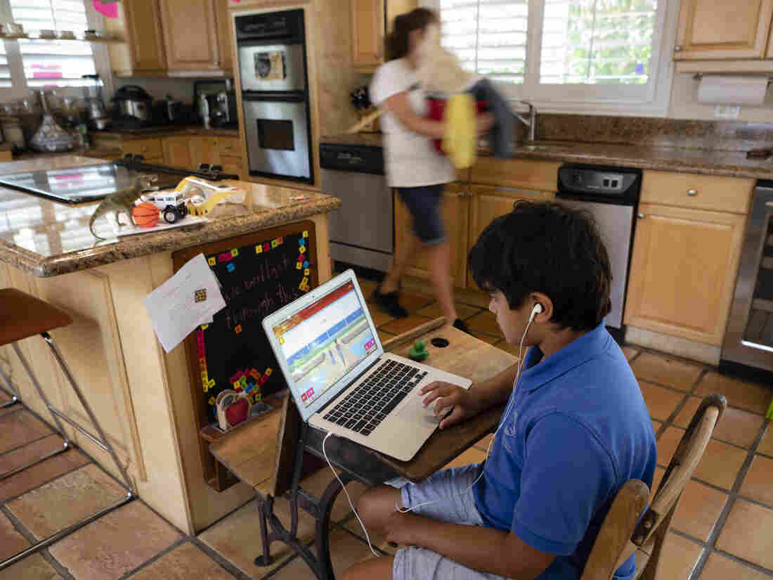 A student attends an online class from home in Miami, Florida, U.S., on Thursday, Sept. 3, 2020. In a victory for state education leaders, an appeals court said Monday that Floridas school reopening order did not force students back to campus, nor teachers back into classrooms, and should remain in effect. Photographer: Eva Marie Uzcategui/Bloomberg via Getty Images