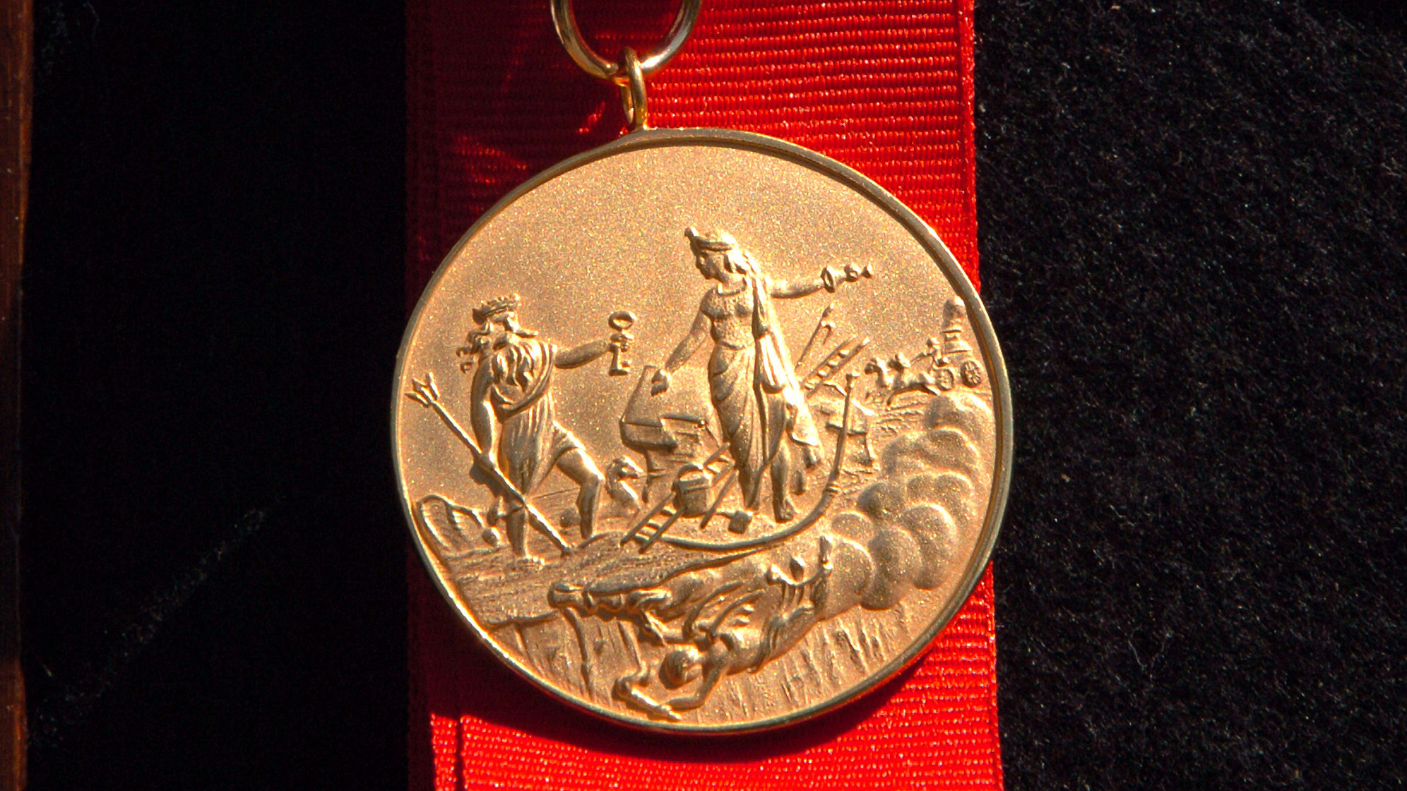 The New York City Fire Department's James Gordon Bennett Medal was established in 1869 and features an image of Neptune (left) wading ashore. It will be renamed the Chief of Department Peter J. Ganci, Jr. Medal. (NY Daily News via Getty Images)