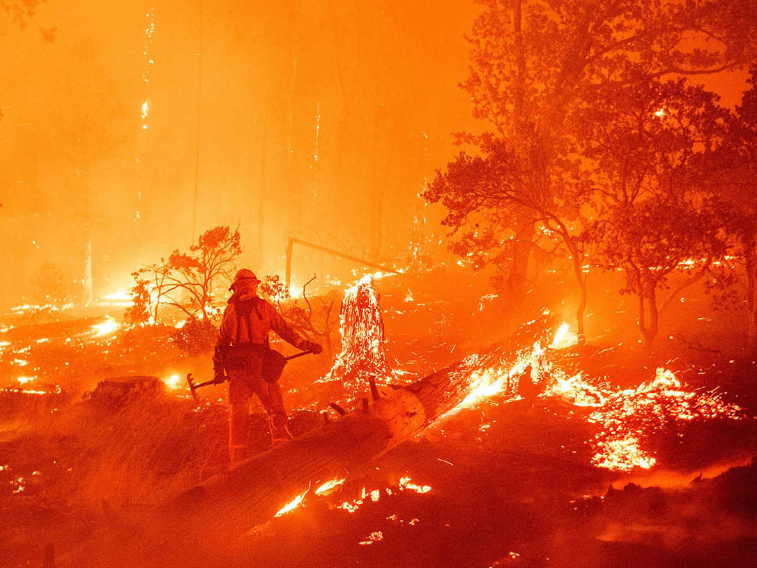 Wildfires across the West, such as the Creek Fire here in Madera County, Calif., are pushing firefighters to their limits. (AFP via Getty Images)