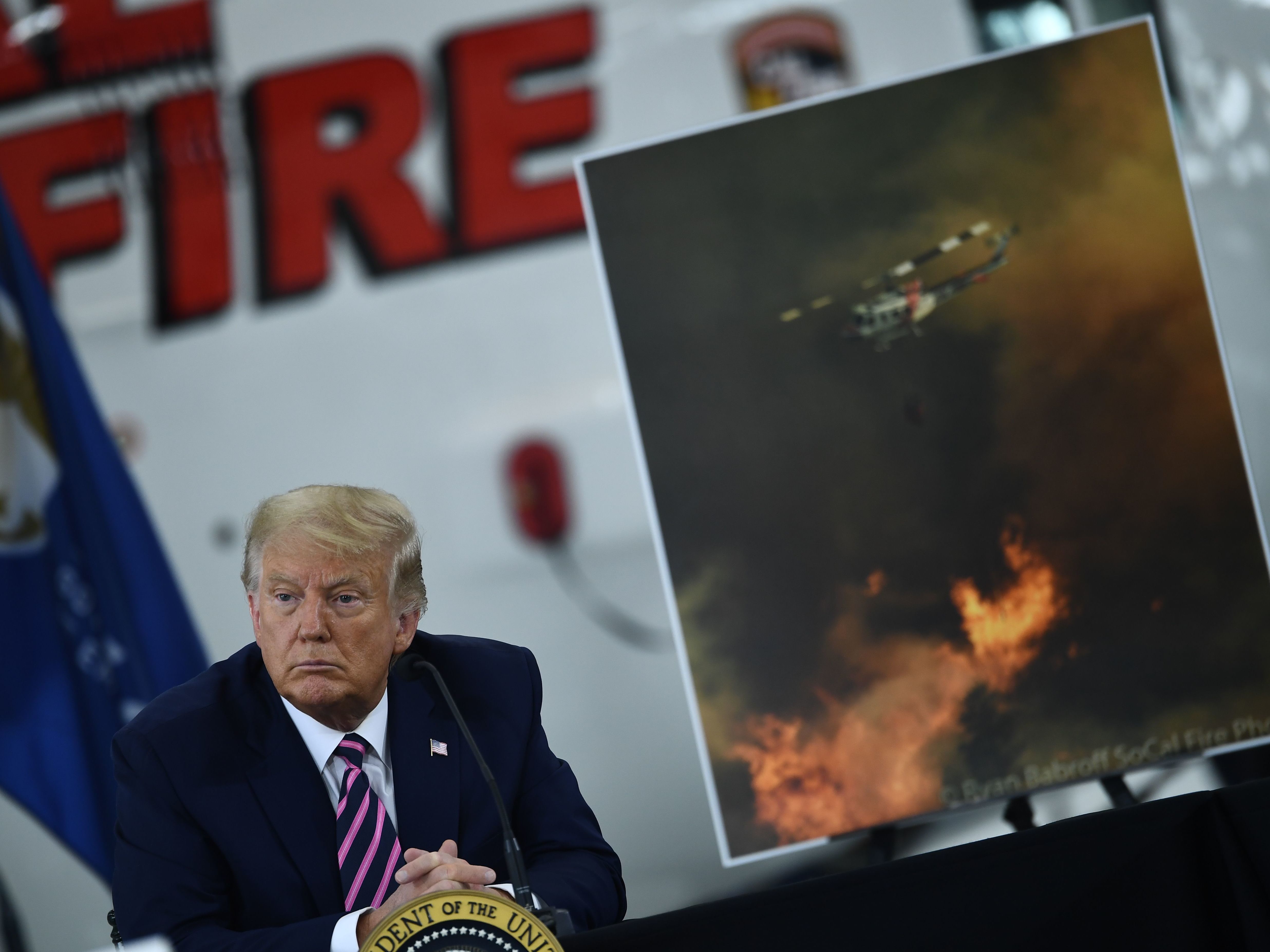 President Trump speaks Monday during a briefing on wildfires in McClellan Park, Calif. (AFP via Getty Images)