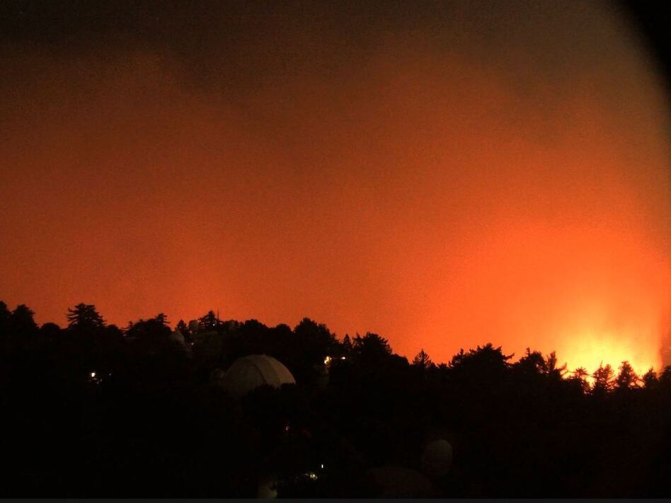A view facing east from the Mount Wilson Observatory near Los Angeles shows the nearby flames of the Bobcat Fire early Wednesday. (Screenshot by NPR/HPWREN)
