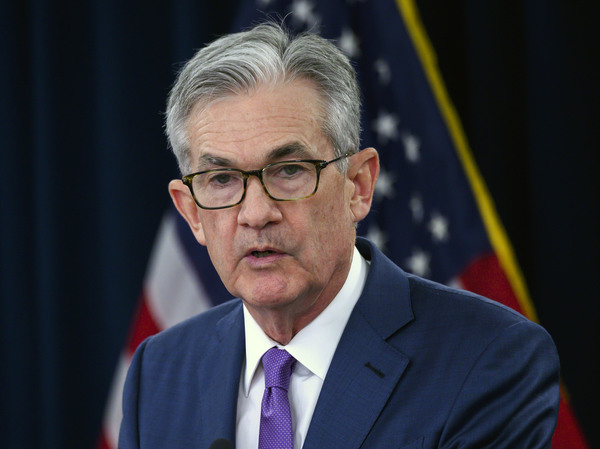 As economic recovery slows, Fed sees many risks and pledges full support