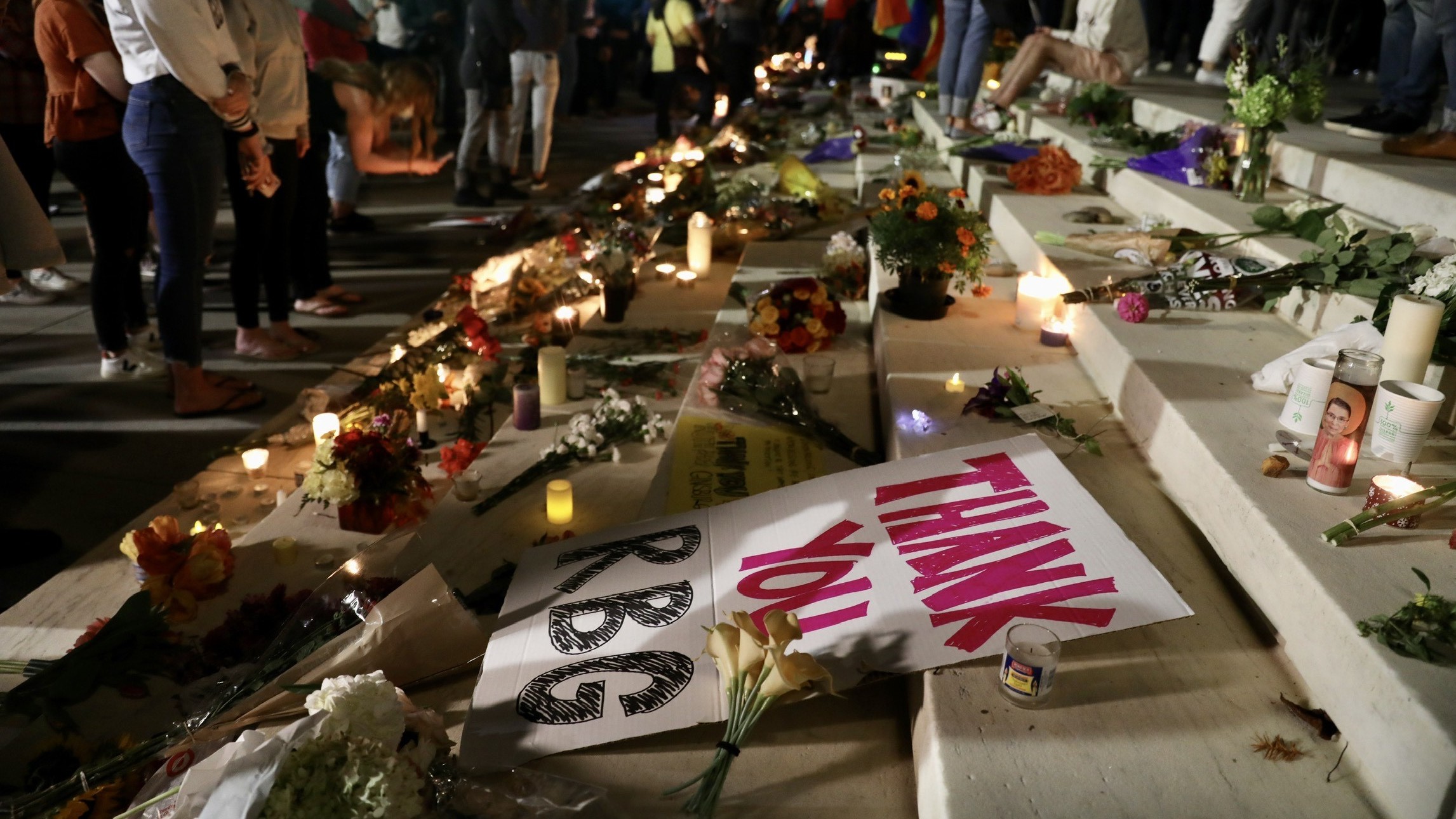 A crowd gathers at the U.S. Supreme Court to mourn the death of Supreme Court Justice Ruth Bader Ginsburg on Friday.