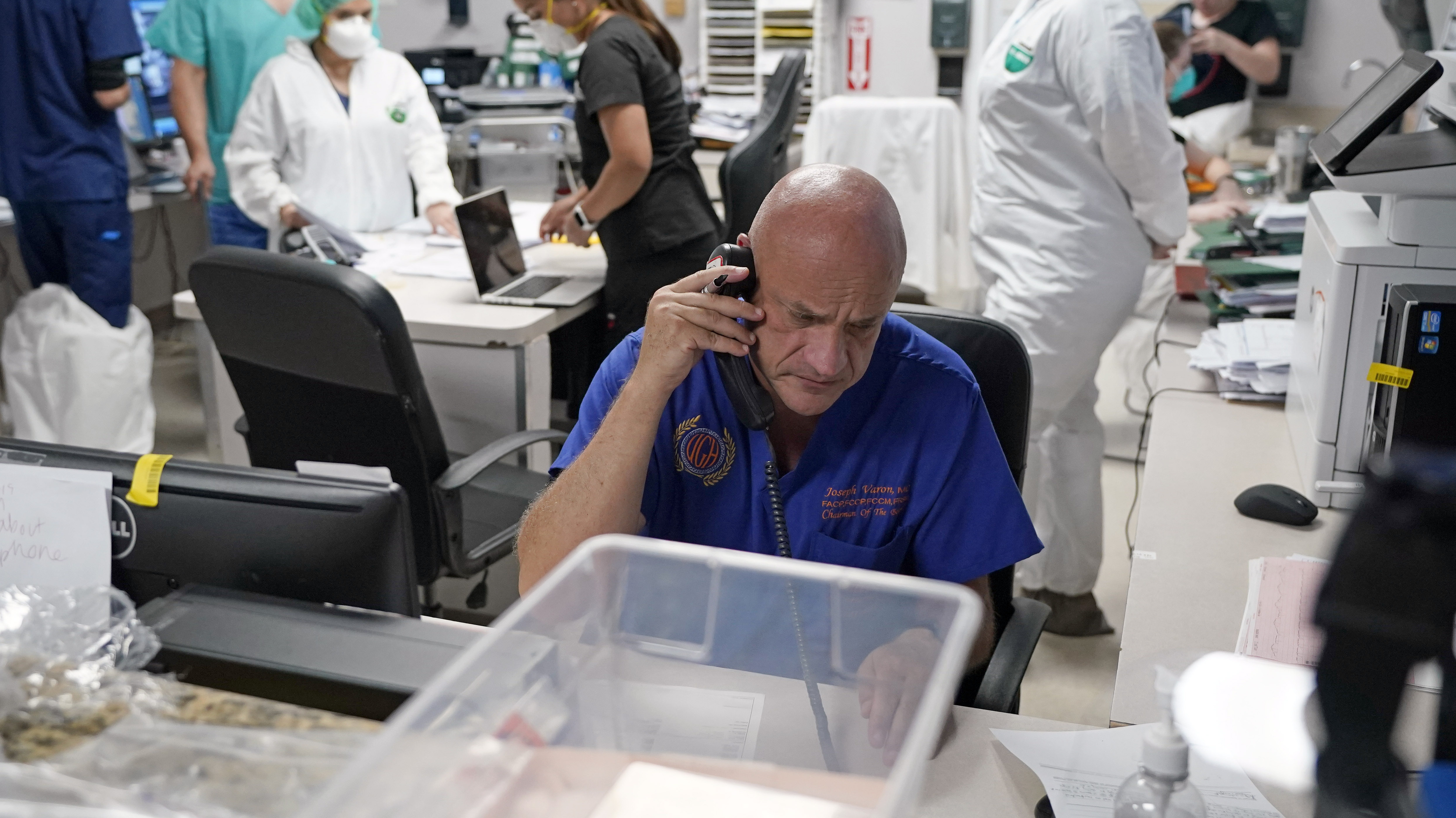 Dr. Joseph Varon notifies the family of a patient who died inside the coronavirus unit at Houston