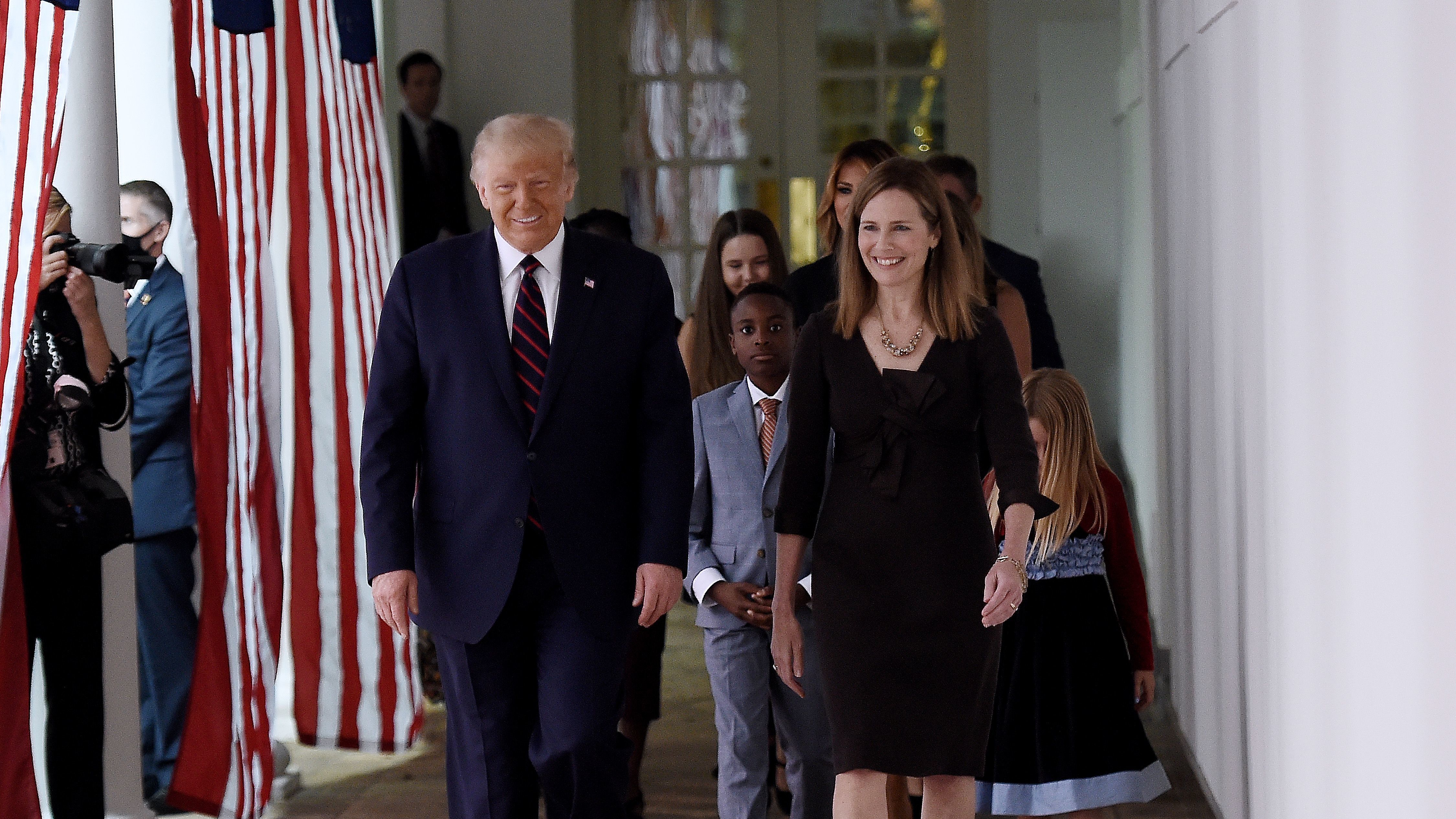 President Trump and Judge Amy Coney Barrett walk to the Rose Garden of the White House in Washington, DC., on Sept. 26.