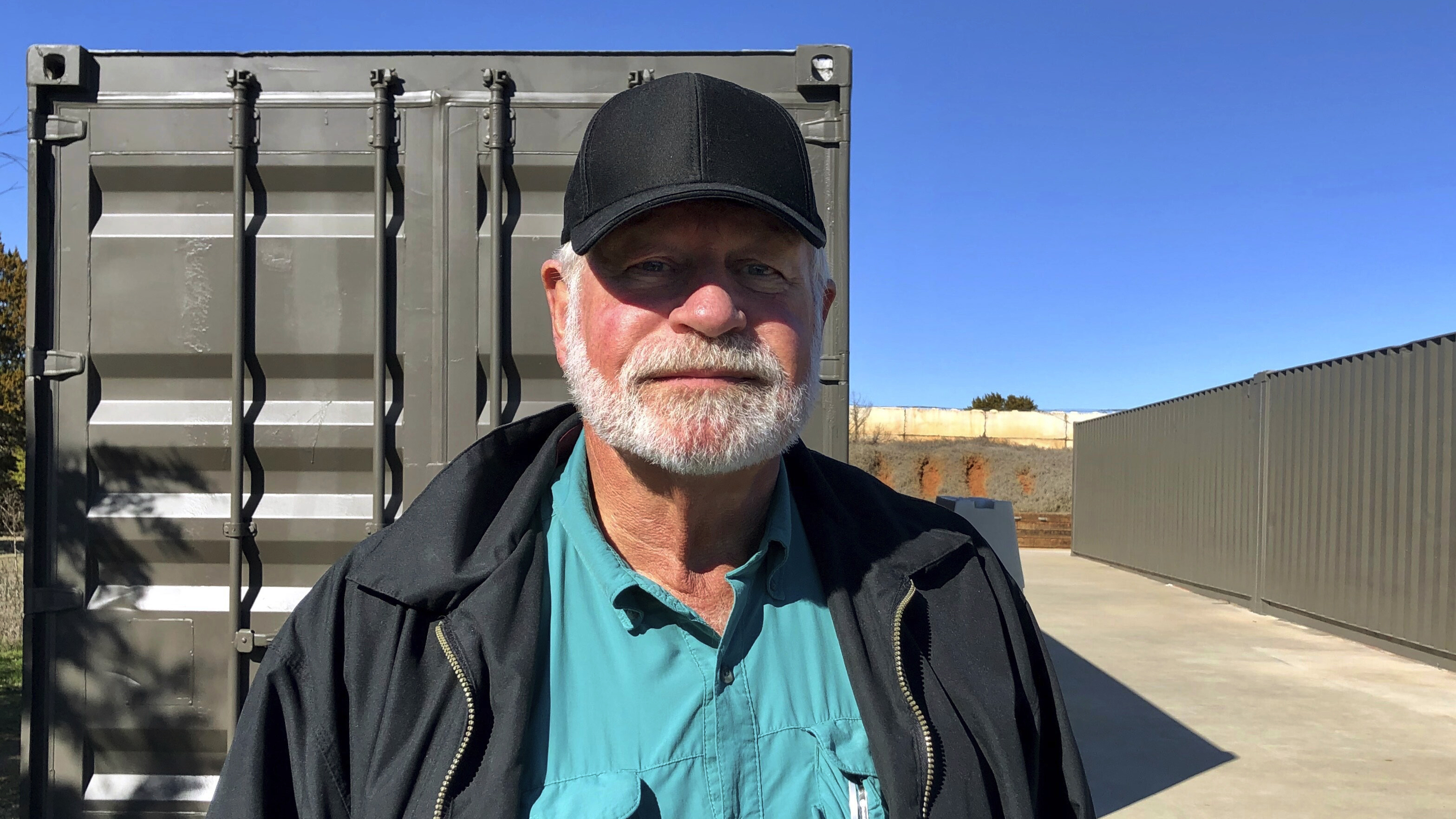 Jack Wilson poses for a photo at a firing range outside his home in Granbury, Texas. Wilson, who trains the volunteer security team of the West Freeway Church of Christ, killed a man who fatally shot two people there on Dec. 29, 2019.