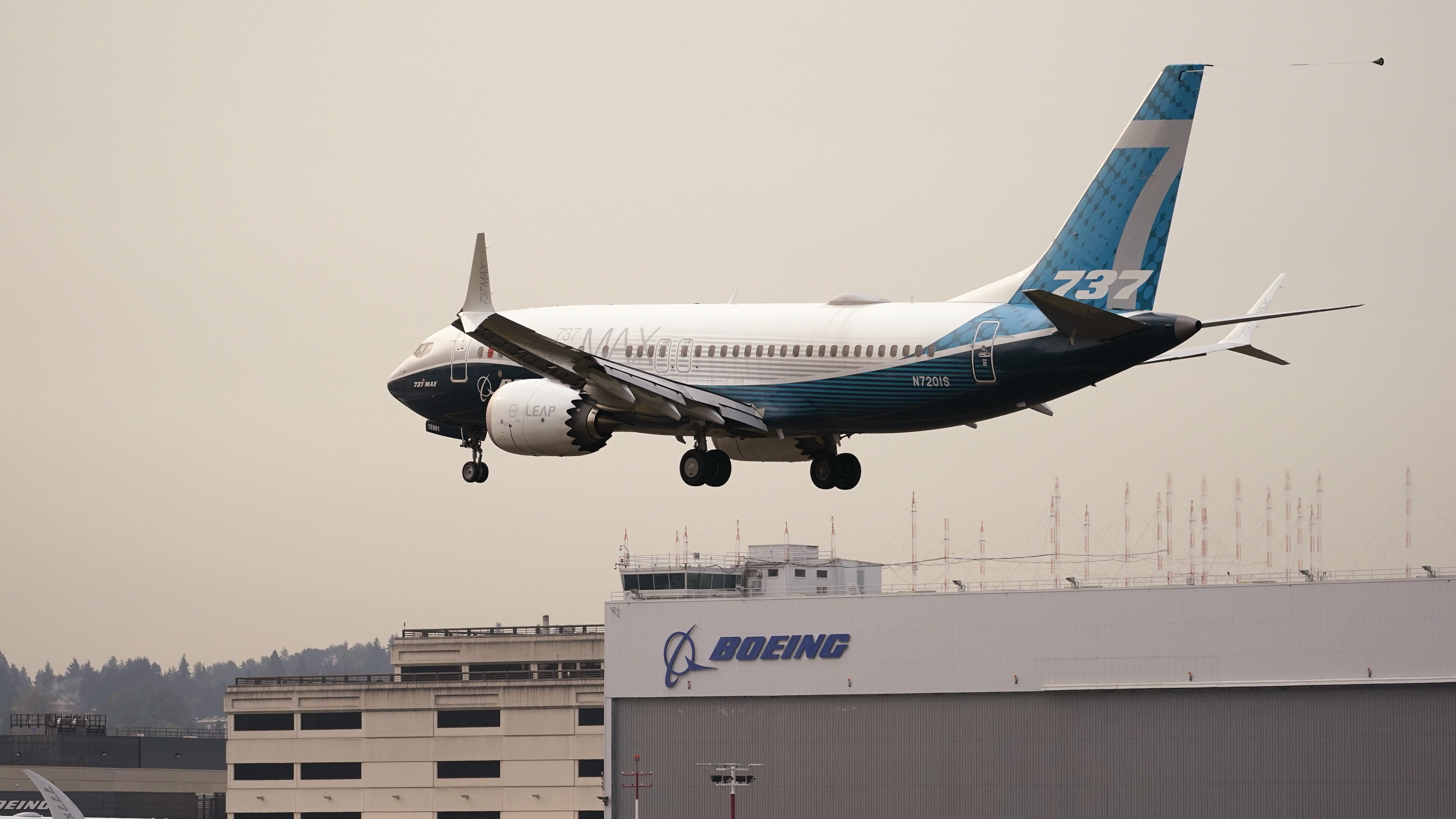 A Boeing 737 MAX jet, piloted by Federal Aviation Administration (FAA) chief Steve Dickson, prepares to land at Boeing Field following a test flight on Wednesday.