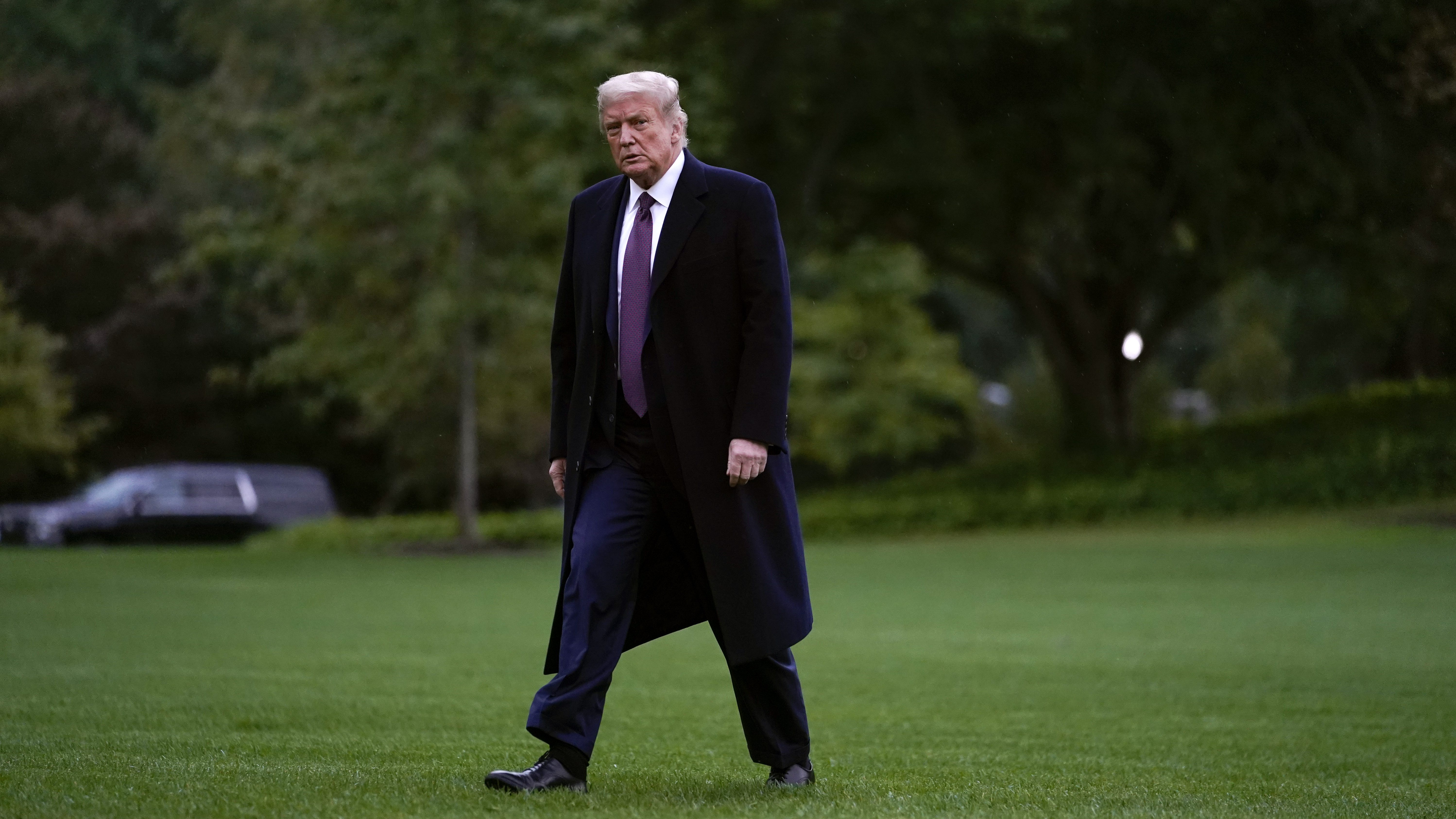 President Trump walks from Marine One to the White House on Thursday, as he returns from a fundraiser in Bedminster, N.J.