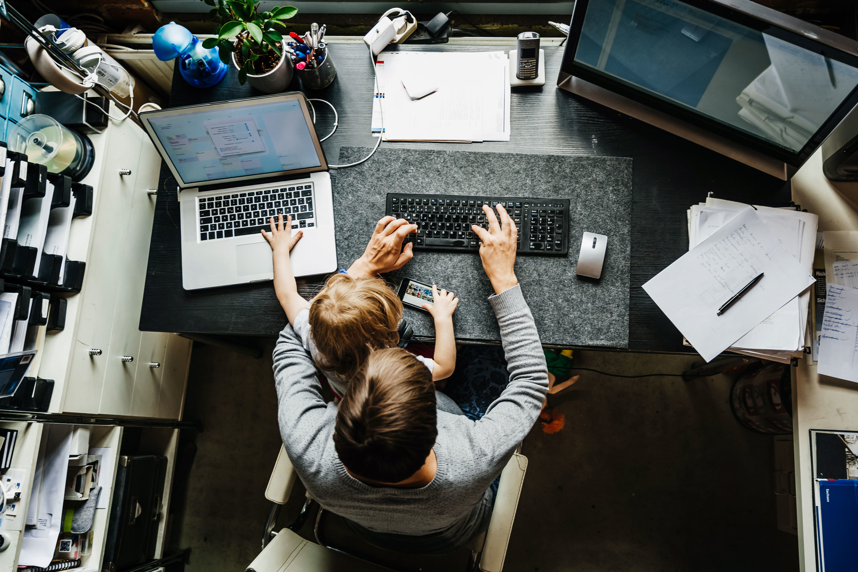 Last month, women left jobs at four times the rate that men did. A new school year with children staying home instead of returning to classrooms in person led many women to drop out of the workforce. (DigitalVision/Getty Images)