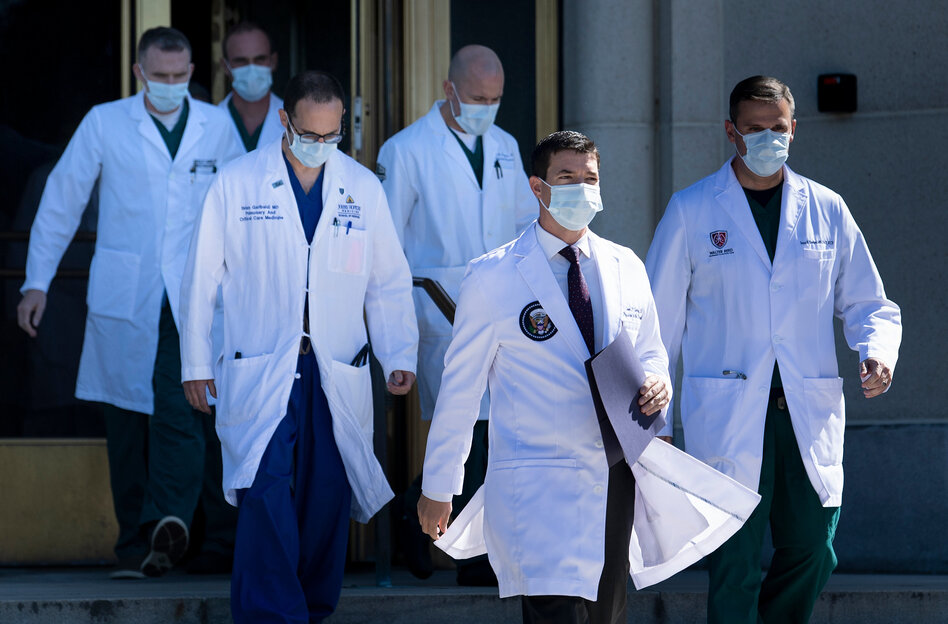 President Trump's team of medical specialists overseeing his care at Walter Reed National Military Medical center. He will still have access to round-the-clock care from the White House medical staff. (Brendan Smialowski /AFP via Getty Images)