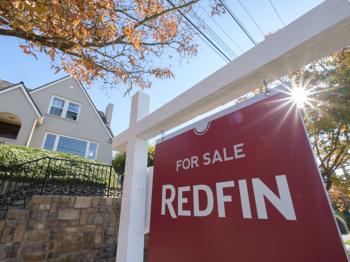 SEATTLE, WA - OCTOBER 31: A Redfin real estate yard sign is pictured in front of a house for sale on October 31, 2017 in Seattle, Washington. (Photo by Stephen Brashear/Getty Images for Redfin)
