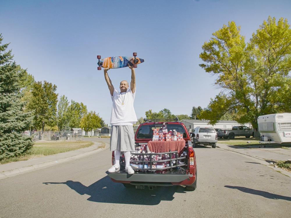 Nathan Apodaca's TikTok video, in which he longboards to Fleetwood Mac's &quot;Dreams,&quot; has catapulted him to viral fame. Here, he is standing in the pickup truck given to him by Ocean Spray. In his video, Apodaca sips from a bottle of Ocean Spray's Cran-Raspberry juice. (Ocean Spray)