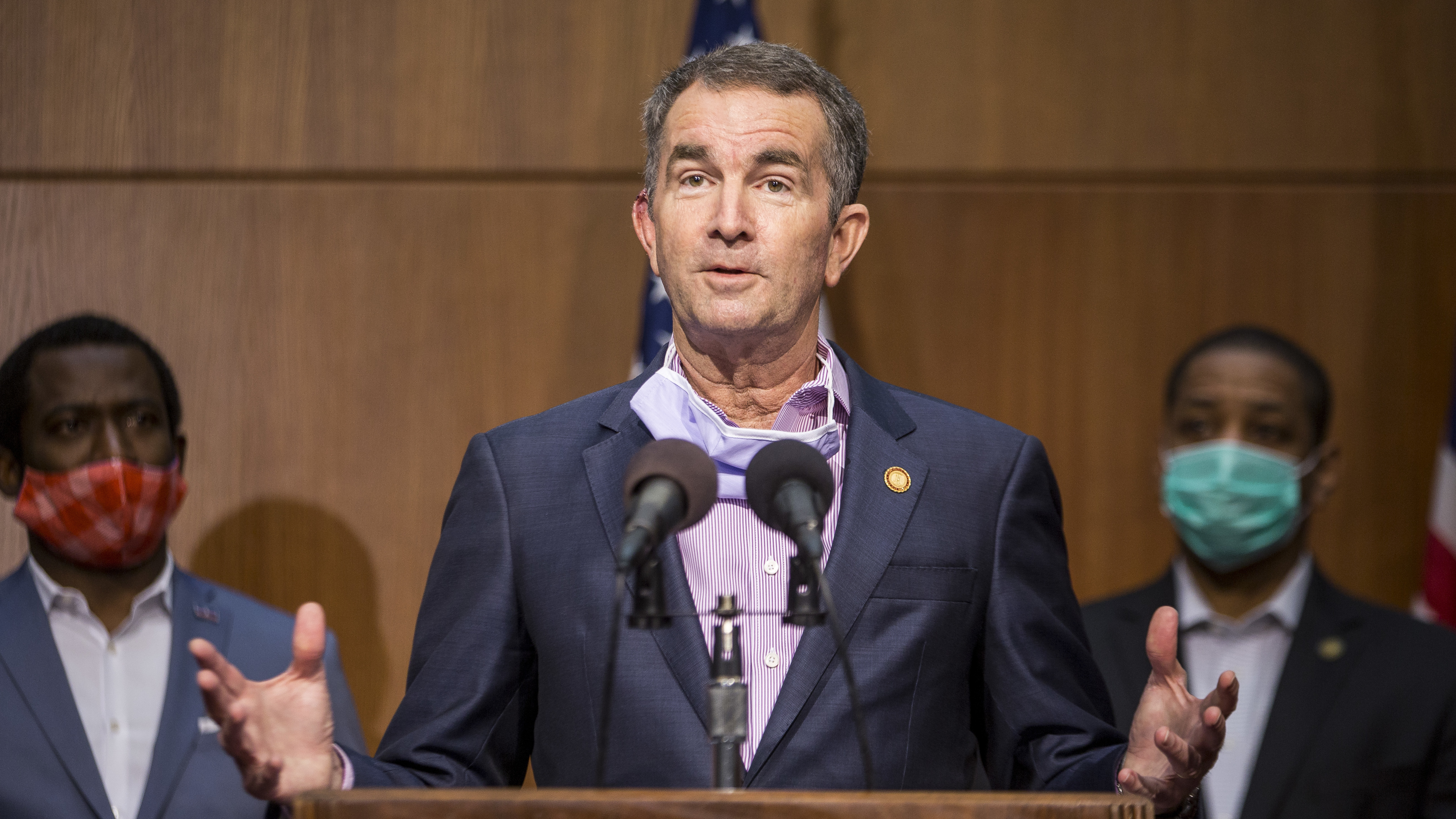 Virginia Gov. Ralph Northam was mentioned as a potential target for kidnapping when a group met to discuss plots to punish governors for their response to the coronavirus, the FBI says. Northam is seen here at a news conference in June in Richmond. (Getty Images)