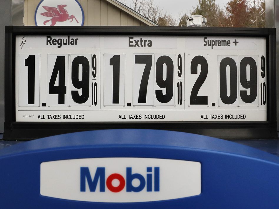 Gasoline prices are posted at a Mobil gas station in Candia, N.H., on April 30. The coronavirus pandemic has renewed a critical debate about just when global oil demand will peak. (Charles Krupa/AP)