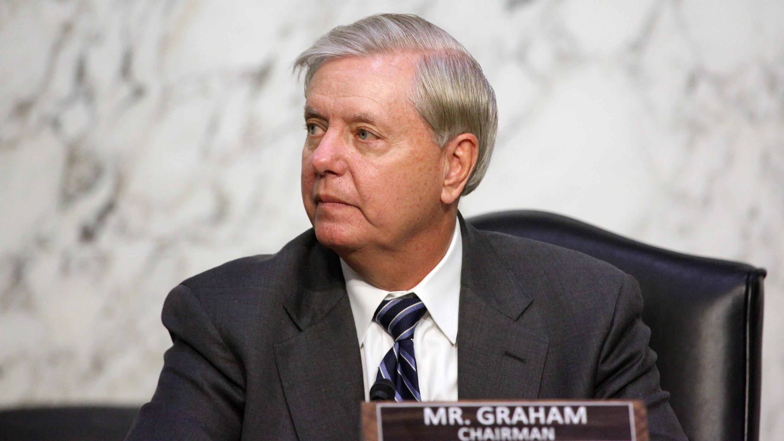 Sen. Lindsey Graham, R-S.C., looks on as Supreme Court nominee Judge Amy Coney Barrett testifies before the Senate Judiciary Committee on the third day of her confirmation hearing. (Getty Images)