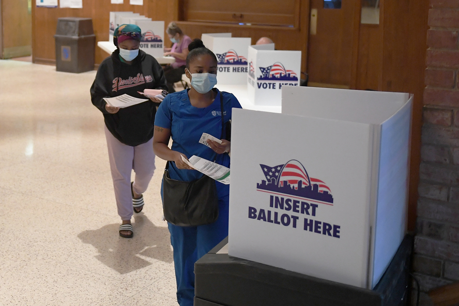 Voters cast their ballots in Missouri's primary election on August 4, 2020 at Gambrinus Hall in St Louis, Missouri. In November, voters will decide on Amendment 3 which would change the state's approach to redistricting.
