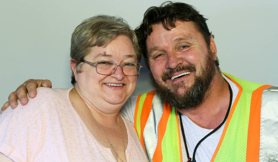 Brian McConnell, right, spoke with his wife, Nora, during a StoryCorps interview in Atlanta in 2016, about his