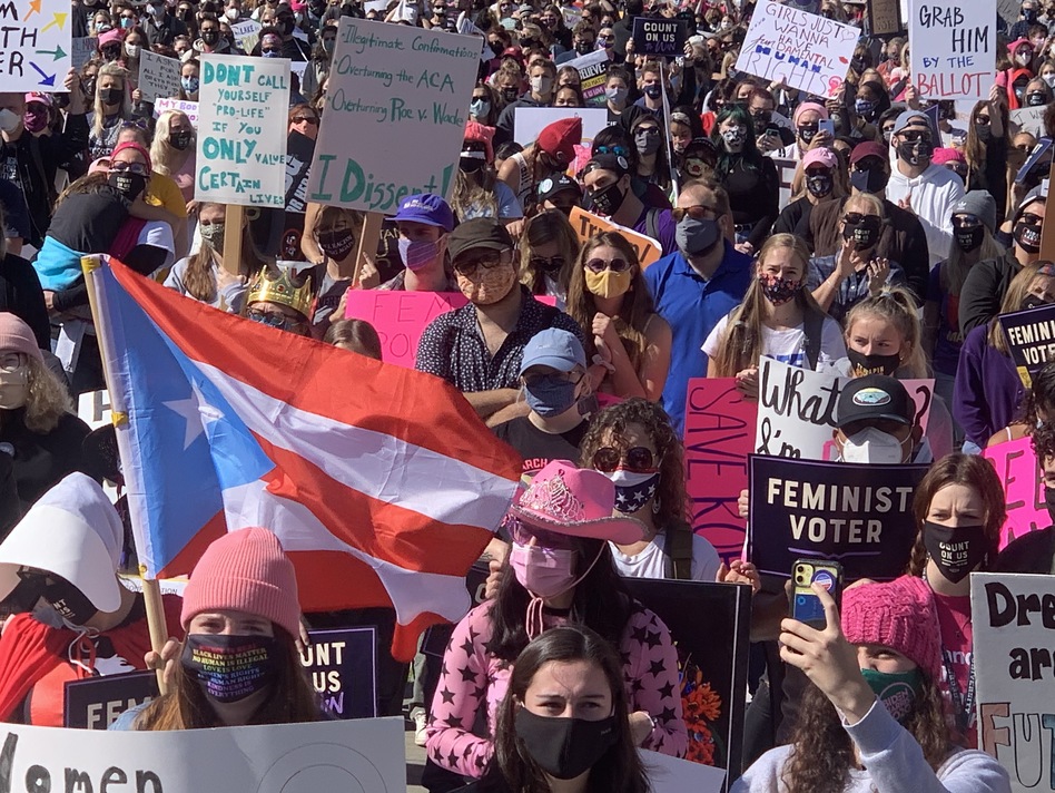 Protesters rally in Washington, D.C., during the latest Women's March, demonstrations that began just after President Trump's inauguration. (Carol Guzy for NPR)