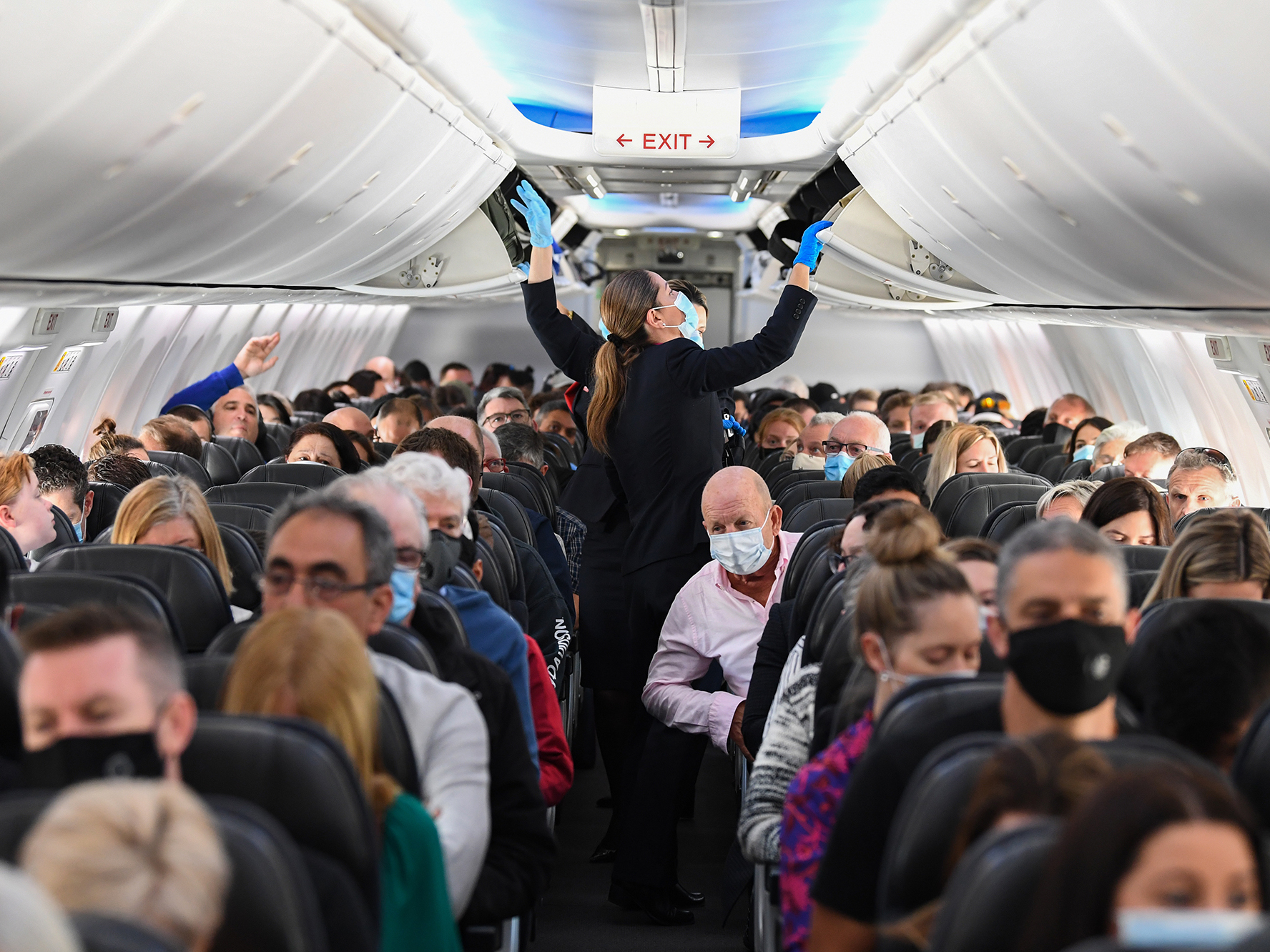 Do Masks On Plane Flights Really Cut Your Risk Of Catching COVID19