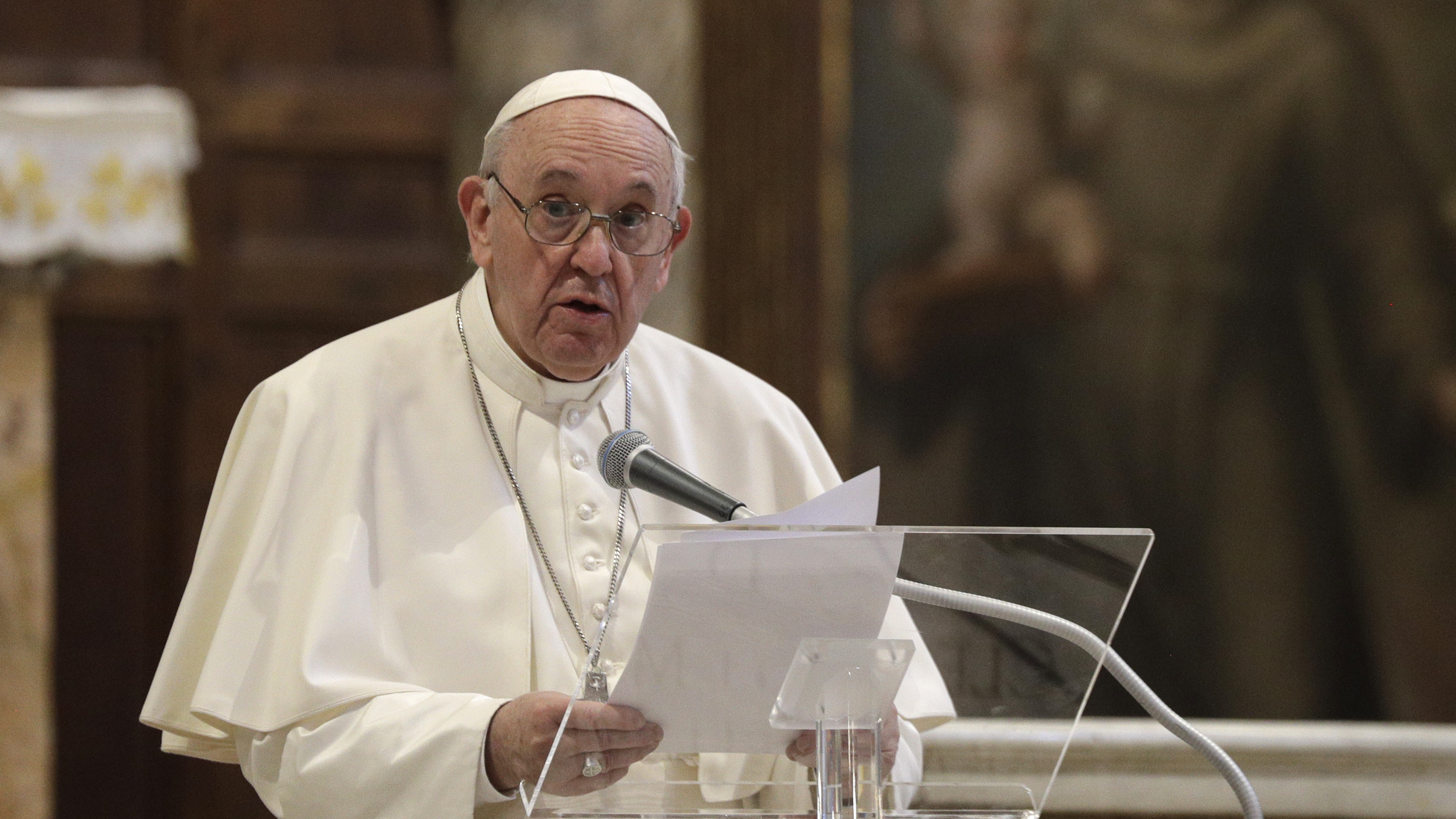 Pope Francis attends a inter-religious ceremony for peace in the Basilica of Santa Maria in Aracoeli, in Rome, on Tuesday.
