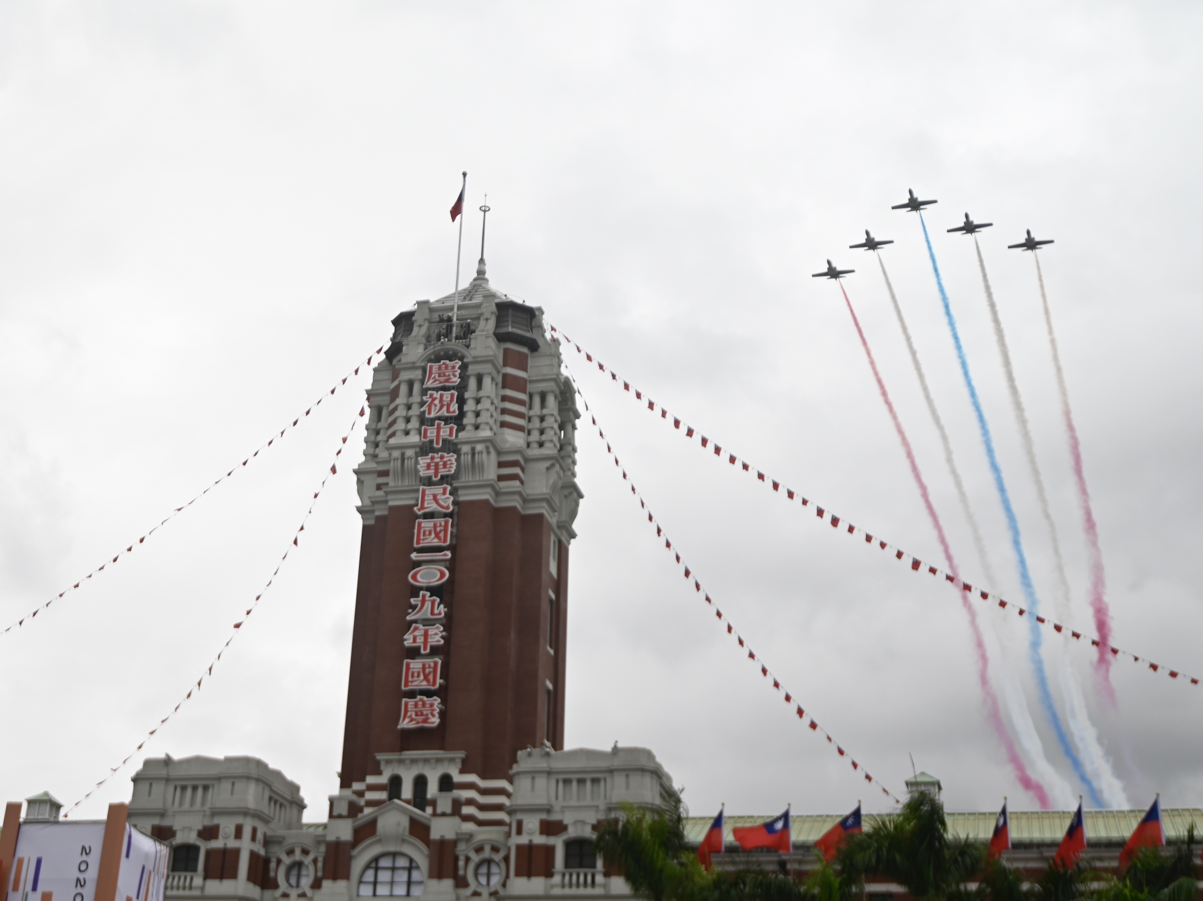 Jets fly over the Presidential Office during Taiwan's National Day in Taipei on Oct. 10. (AFP via Getty Images)