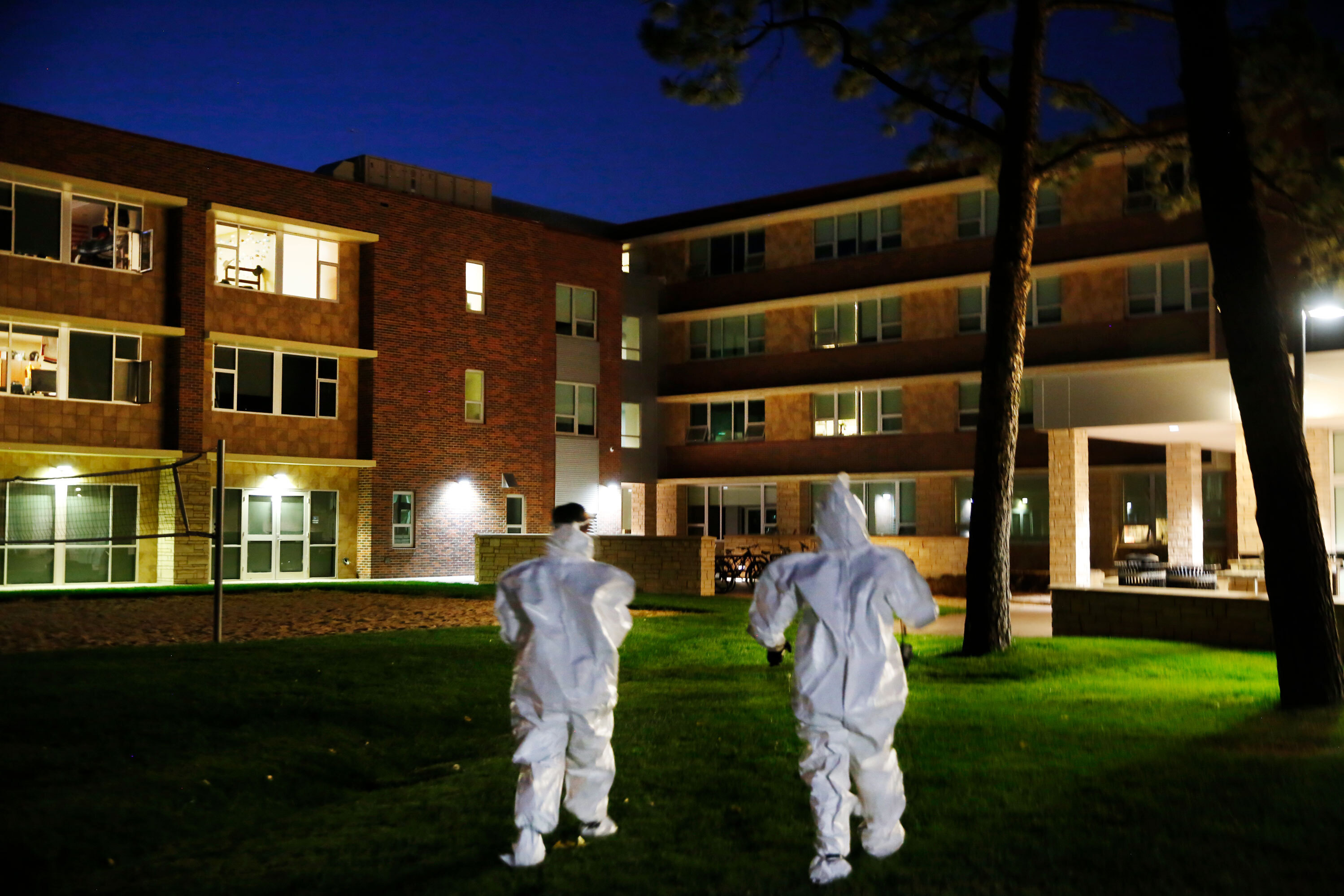Researchers at Colorado College visit South Hall, a mostly freshman dorm, to collect wastewater samples for coronavirus testing. (NPR)