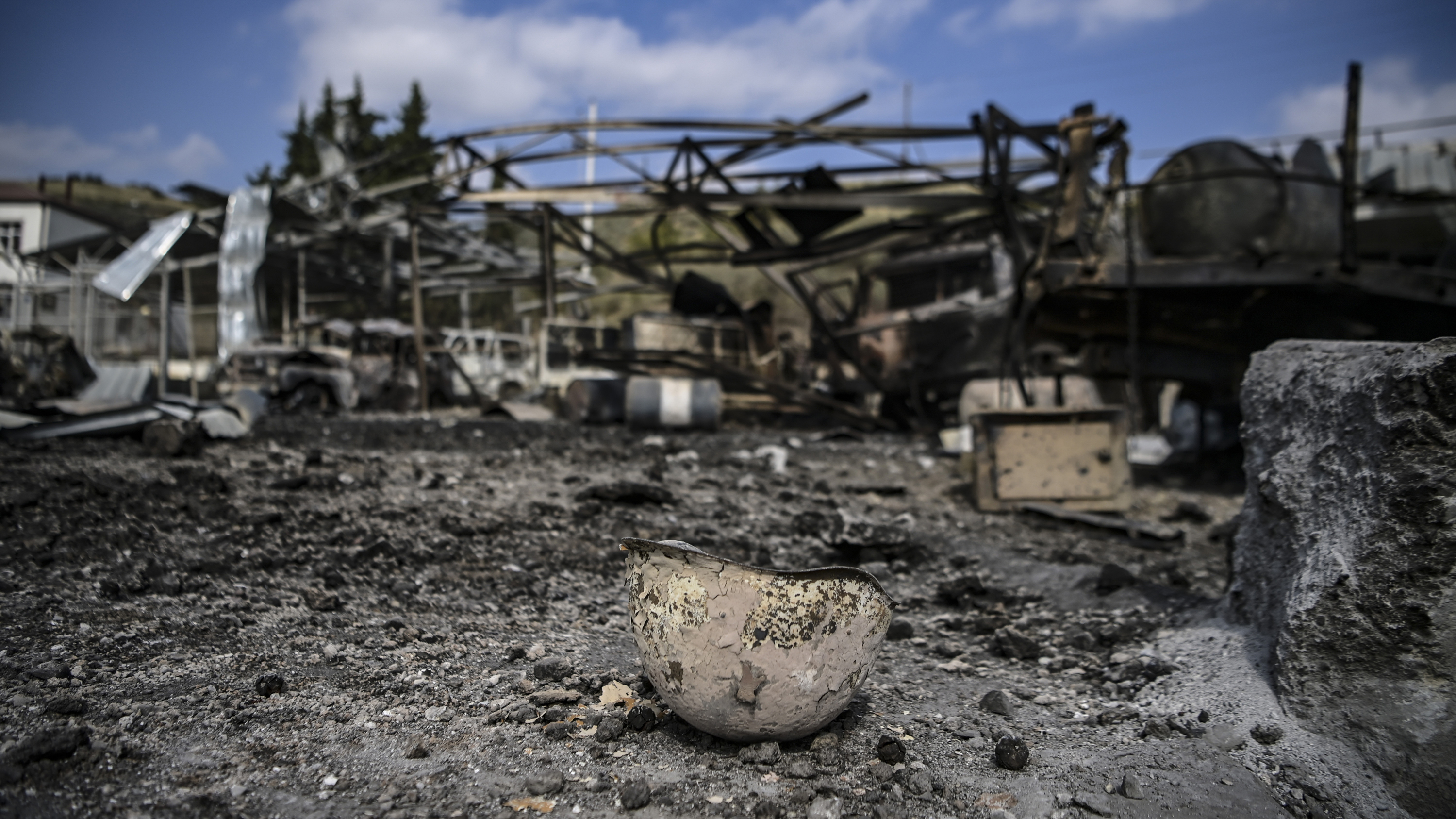 A burned helmet lying on the ground of the hospital in Martakert, a day after shelling during the ongoing fighting between Armenia and Azerbaijan over the disputed region of Nagorno-Karabakh.