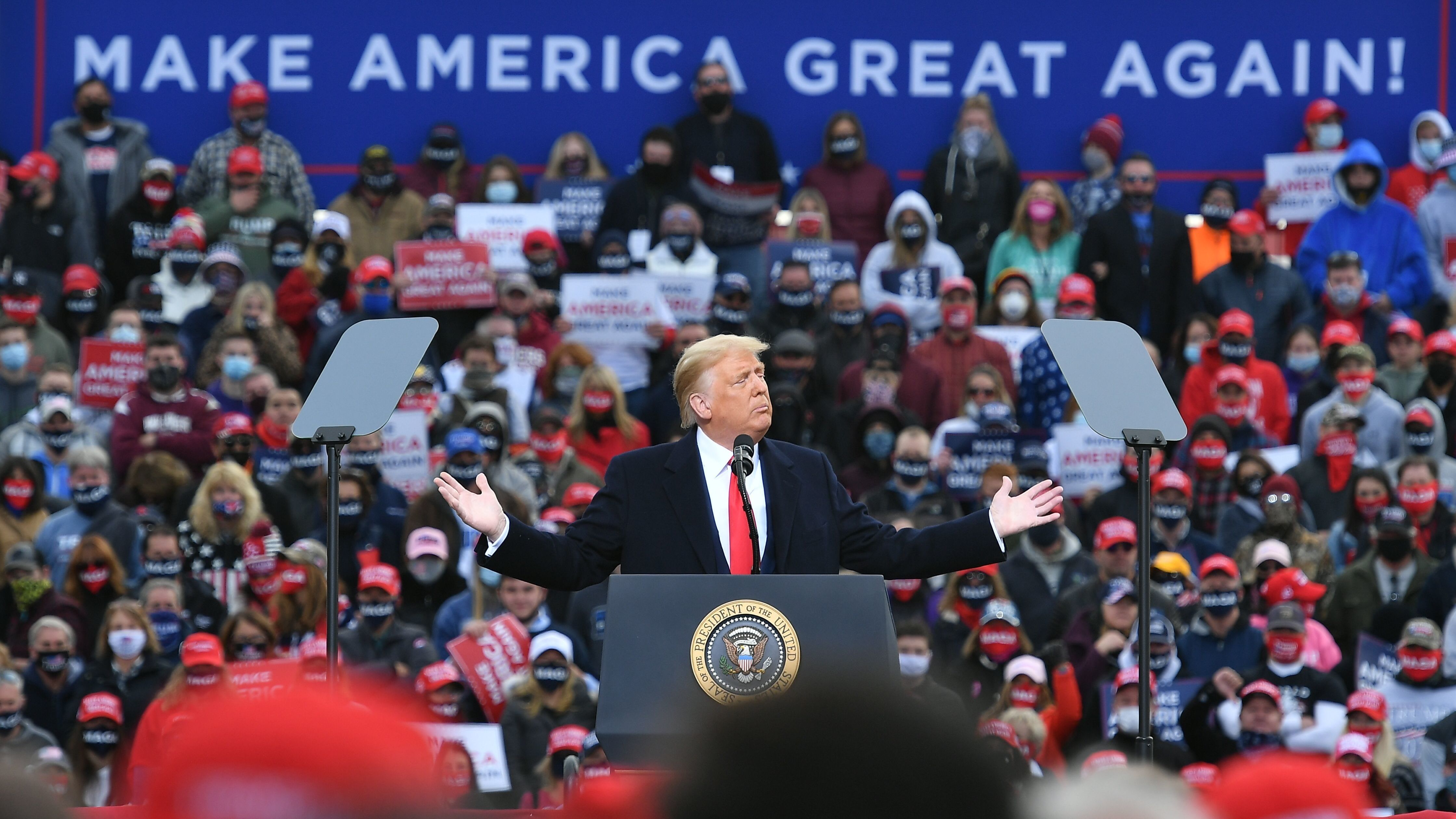 President Trump holds a rally in Londonderry, N.H., on Sunday. (AFP via Getty Images)