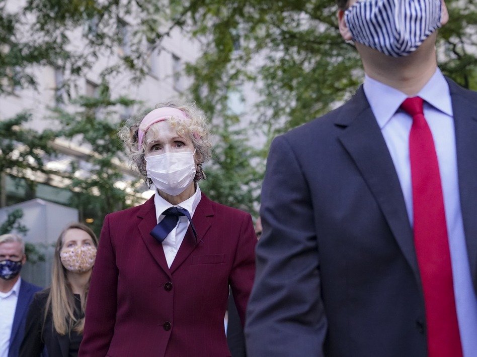 E. Jean Carroll (left), who has accused President Trump of raping her in the 1990s, leaves federal court in New York City after a hearing last week in her defamation lawsuit. (John Minchillo/AP)