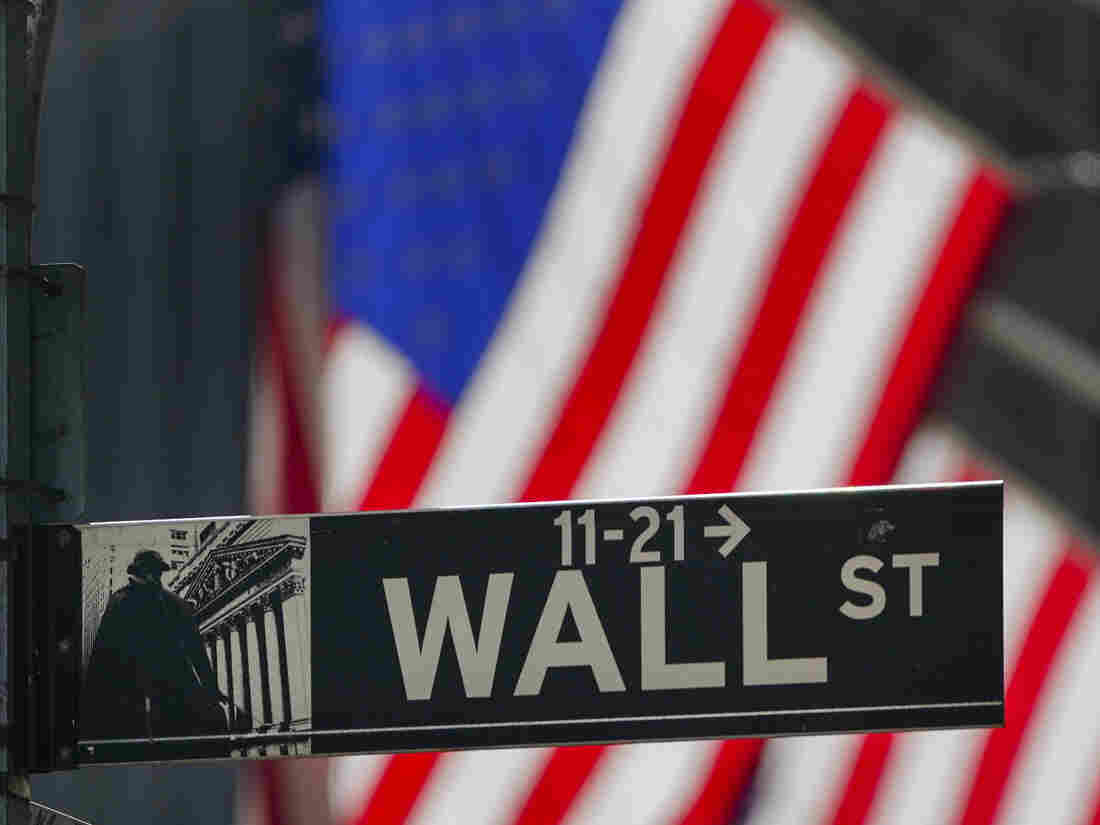 Stocks Sink As Rising Coronavirus Cases Deepen Fears About Economy 1 ap 20288659538885 37b79a2b06bb126f12b5297a40474ef8230d33c2 s1100 c15