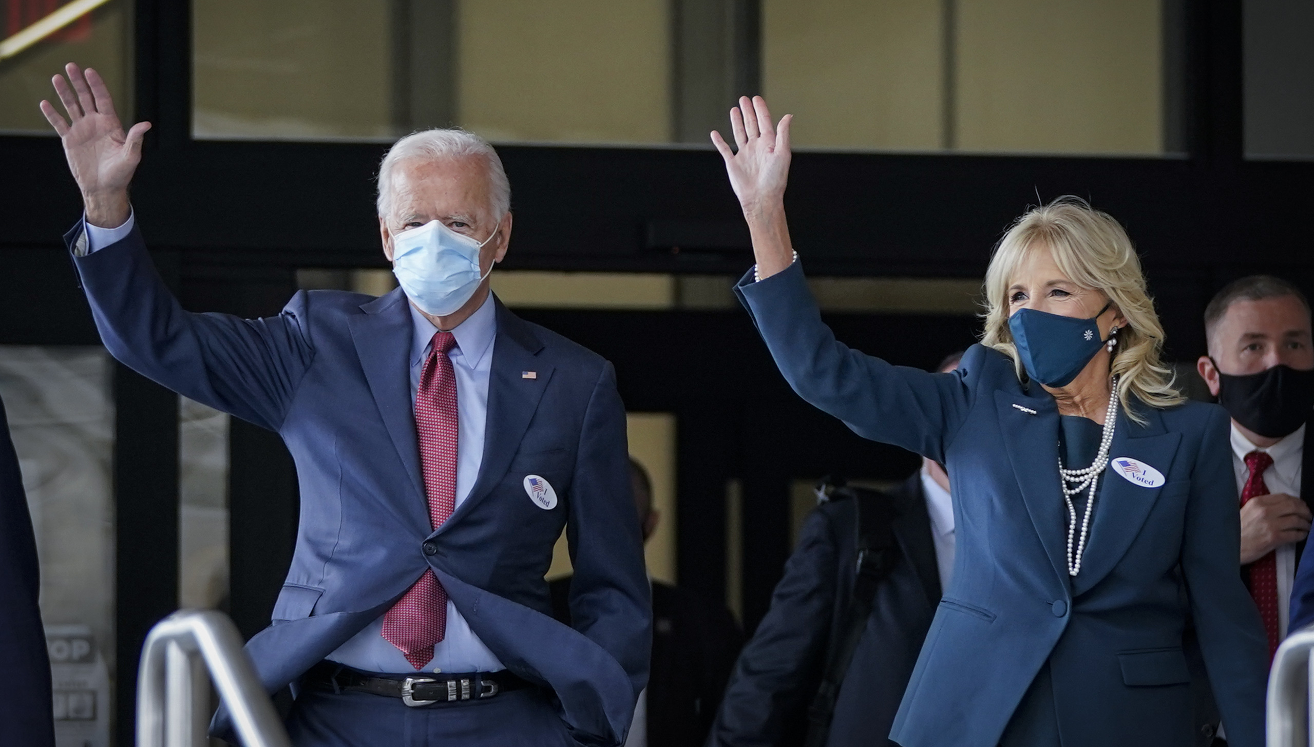 Democratic presidential nominee Joe Biden and his wife, Jill Biden, depart after casting their ballots Wednesday at the Carvel State Office Building in Wilmington, Del. (Getty Images)
