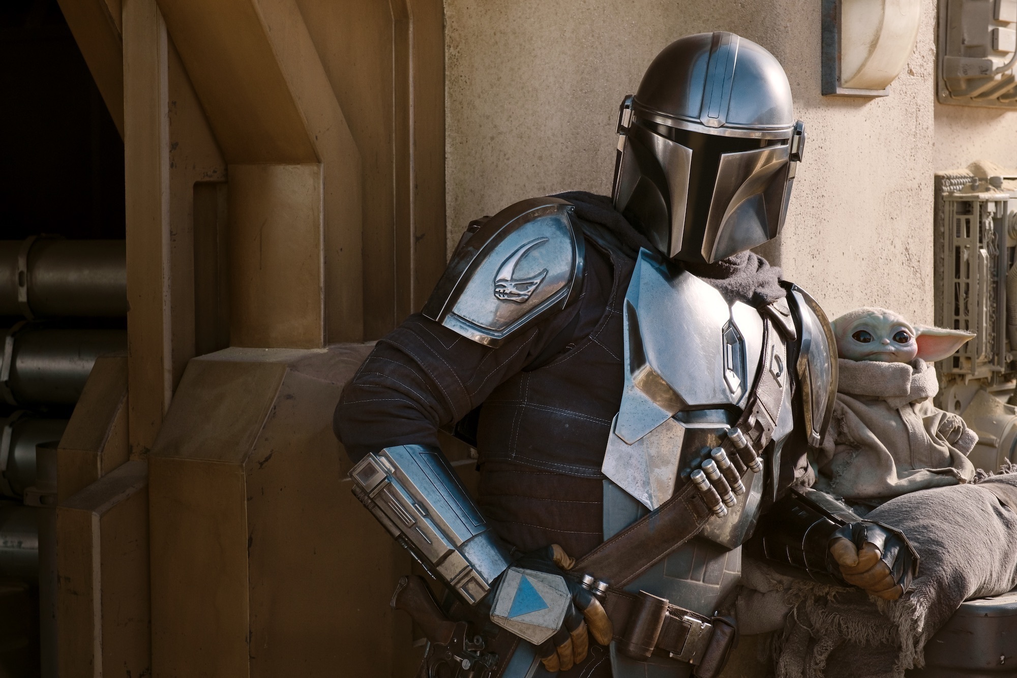 The Mandalorian (Pedro Pascal) and The Child in Season 2 of <em>The Mandalorian on </em>Disney+. (Disney+)