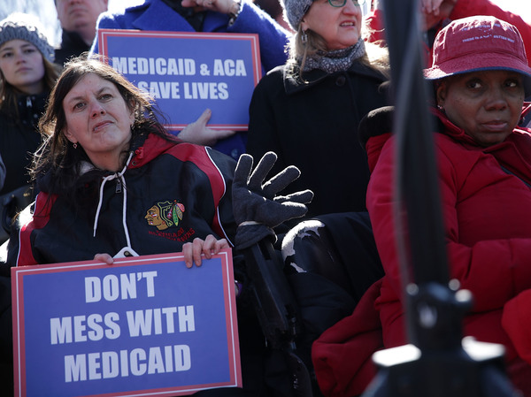 Health care activists rallied in front of the U.S. Capitol on March 22, 2017, to protest Republican efforts that would have dismantled the Affordable Care Act and capped federal payments for Medicaid patients. The Republican congressional bills, part of the party's "repeal and replace" push in 2017, were eventually defeated.