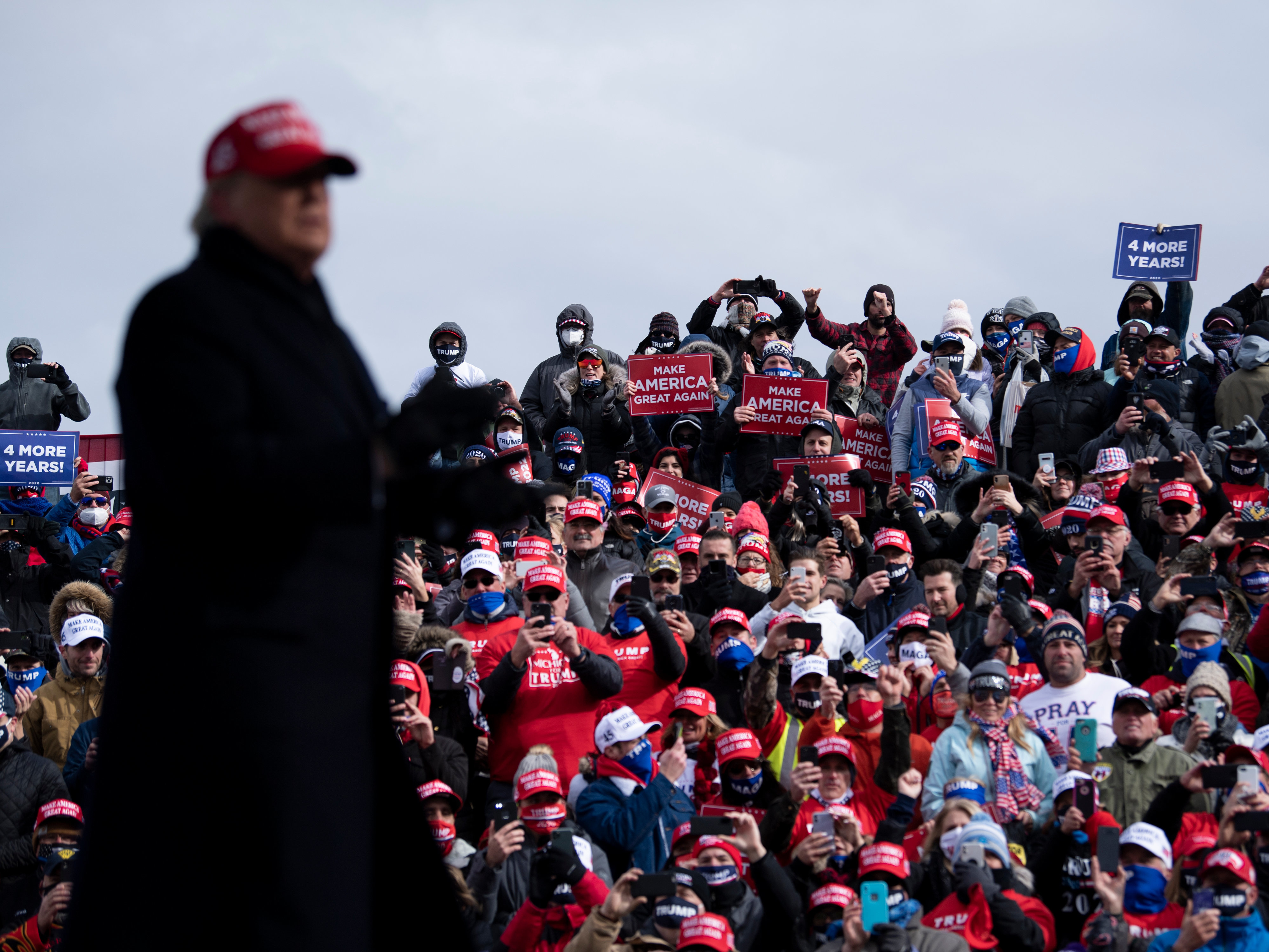 President Trump speaks at a rally in Washington, Mich., on Sunday. (AFP via Getty Images)