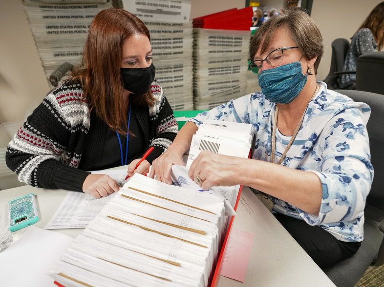 Lehigh County workers count ballots as vote counting in the general election continues on Thursday in Allentown, Pa. (Mary Altaffer/AP)
