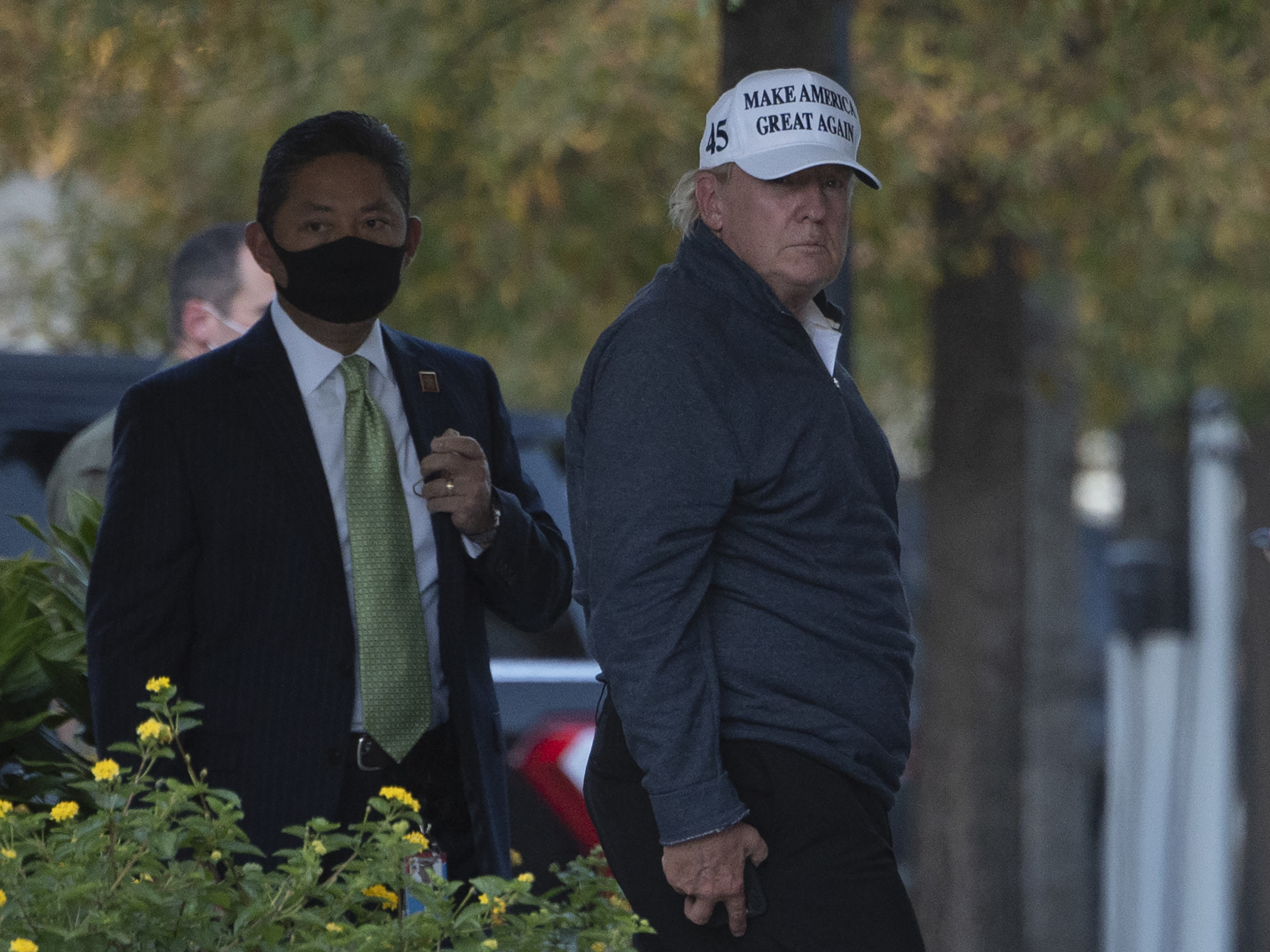 President Trump returns to the White House from playing golf Saturday after Joe Biden was declared the winner of the 2020 presidential election. (AFP via Getty Images)
