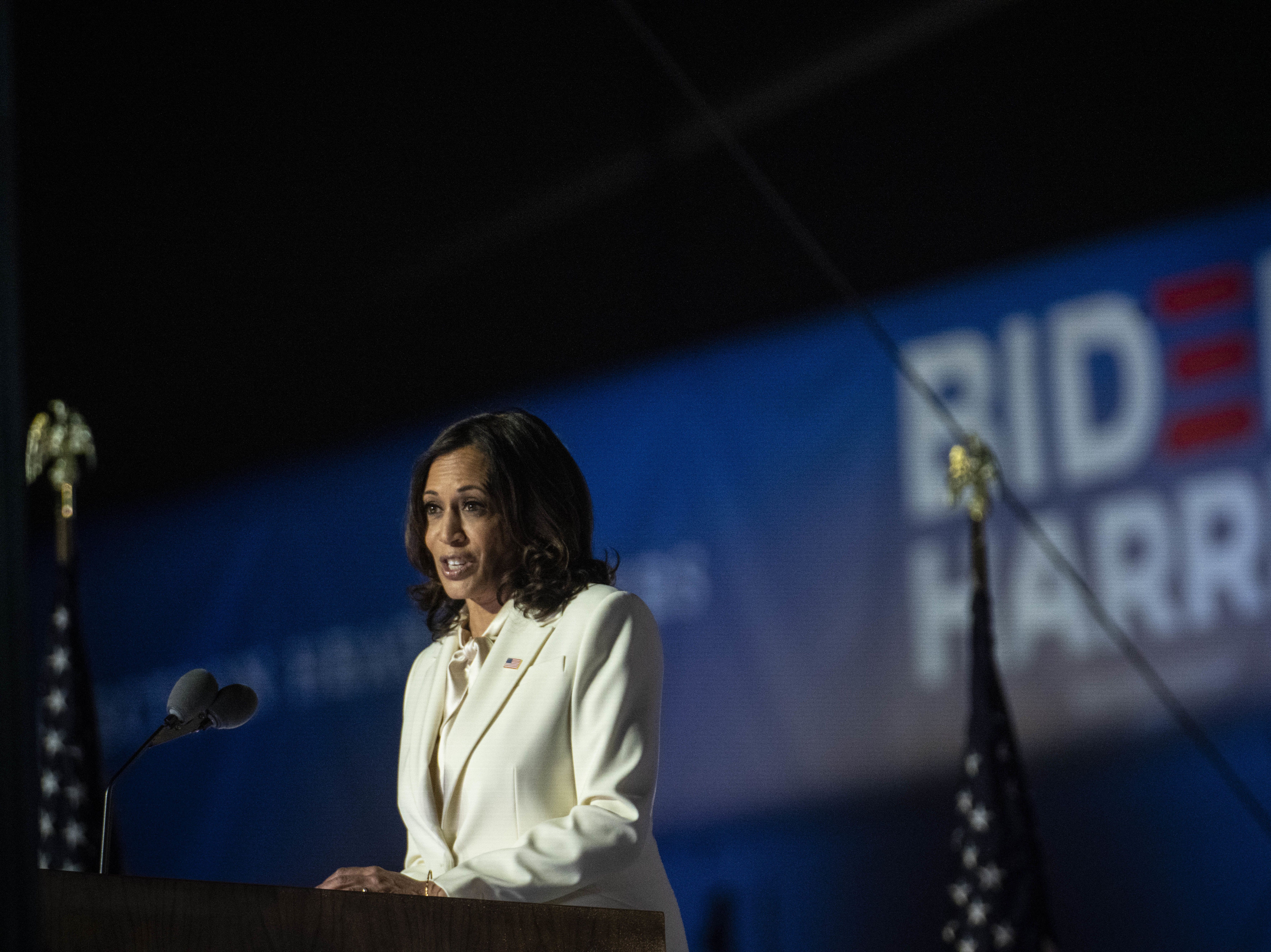 Vice President-elect Kamala Harris delivers an address to the nation from Wilmington, Del., on Saturday. Harris will not only be the first Black, and first female, vice president. She's also the first Indian American and the first Asian American elected to the office. (Bloomberg via Getty Images)