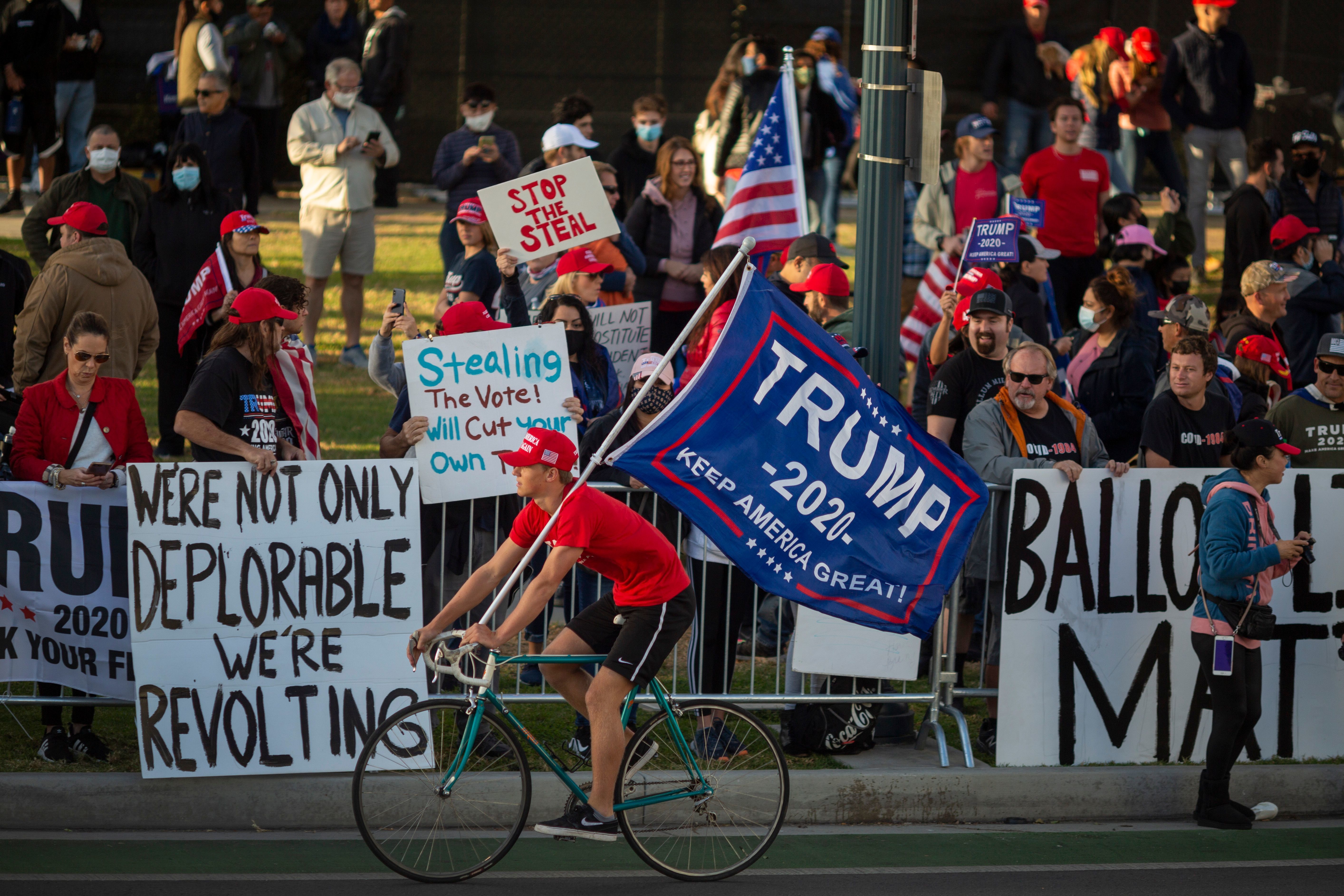 Supporters of President Trump rally in Beverly Hills, Calif., on Saturday after Democratic nominee Joe Biden was declared to have won the 2020 presidential election. (AFP via Getty Images)