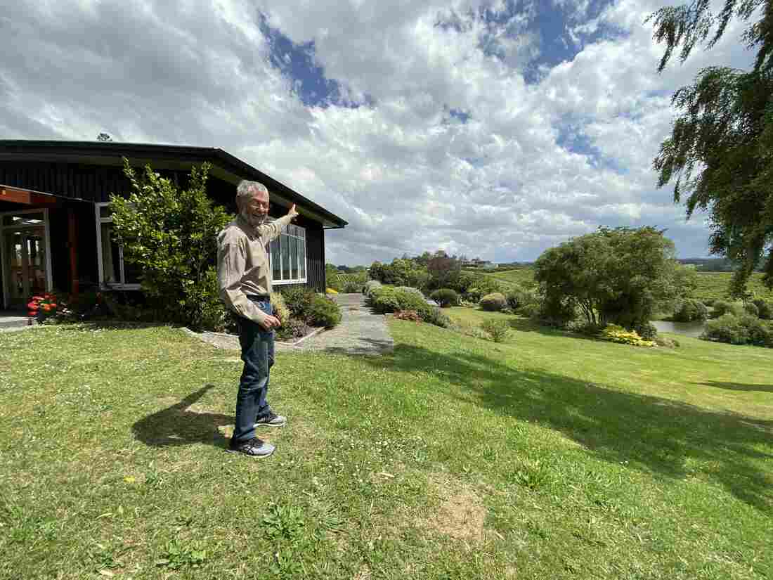 Phillip Woollaston points toward the Earth's ozone hole.