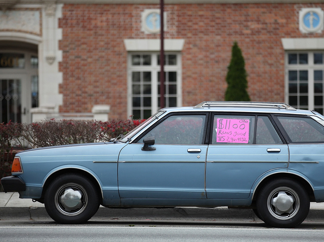 SAN FRANCISCO, CA - JUNE 09: A used car with a for sale sign (Photo by Justin Sullivan/Getty Images)
