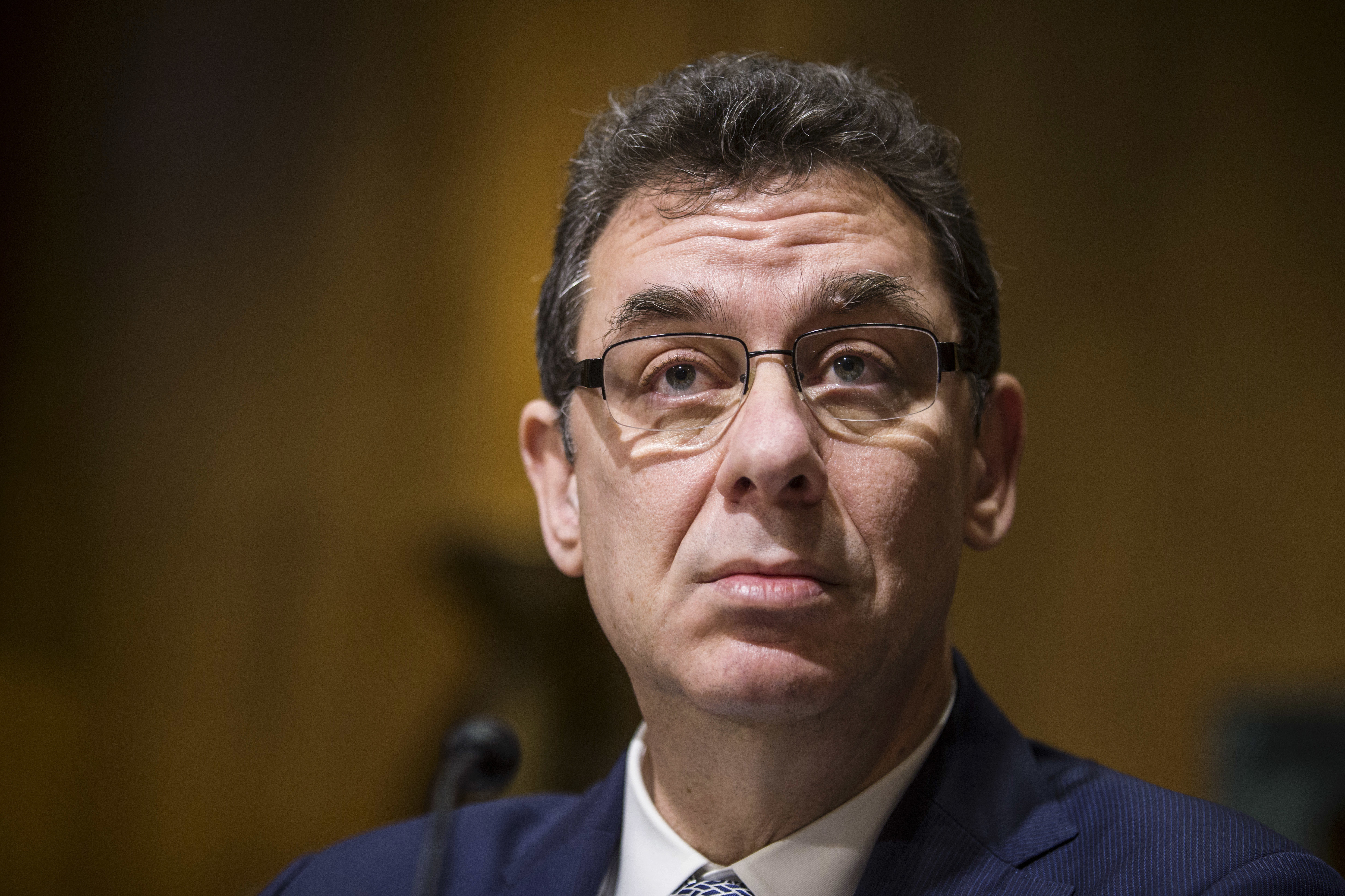 Albert Bourla, chairman and CEO of Pfizer, sold millions of dollars' worth of company stock on Monday as part of a preset plan. But NPR found irregularities about when the CEO entered into that plan. (Bloomberg via Getty Images)