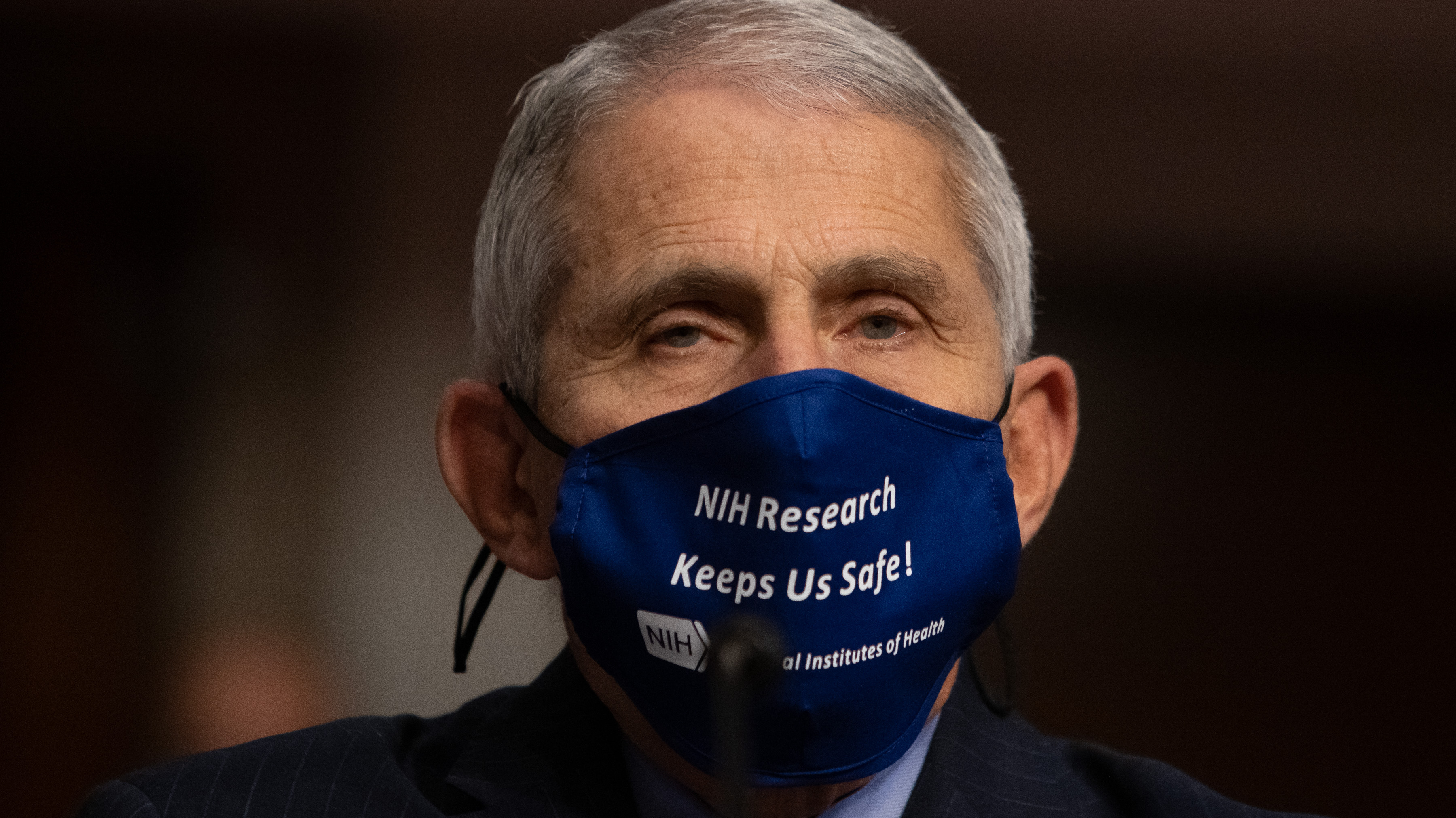 Dr. Anthony Fauci, director of the National Institute of Allergy and Infectious Diseases at NIH, is pictured on Capitol Hill on Sept. 23. Fauci tells NPR it's &quot;OK to celebrate&quot; the vaccine news. (Getty Images)